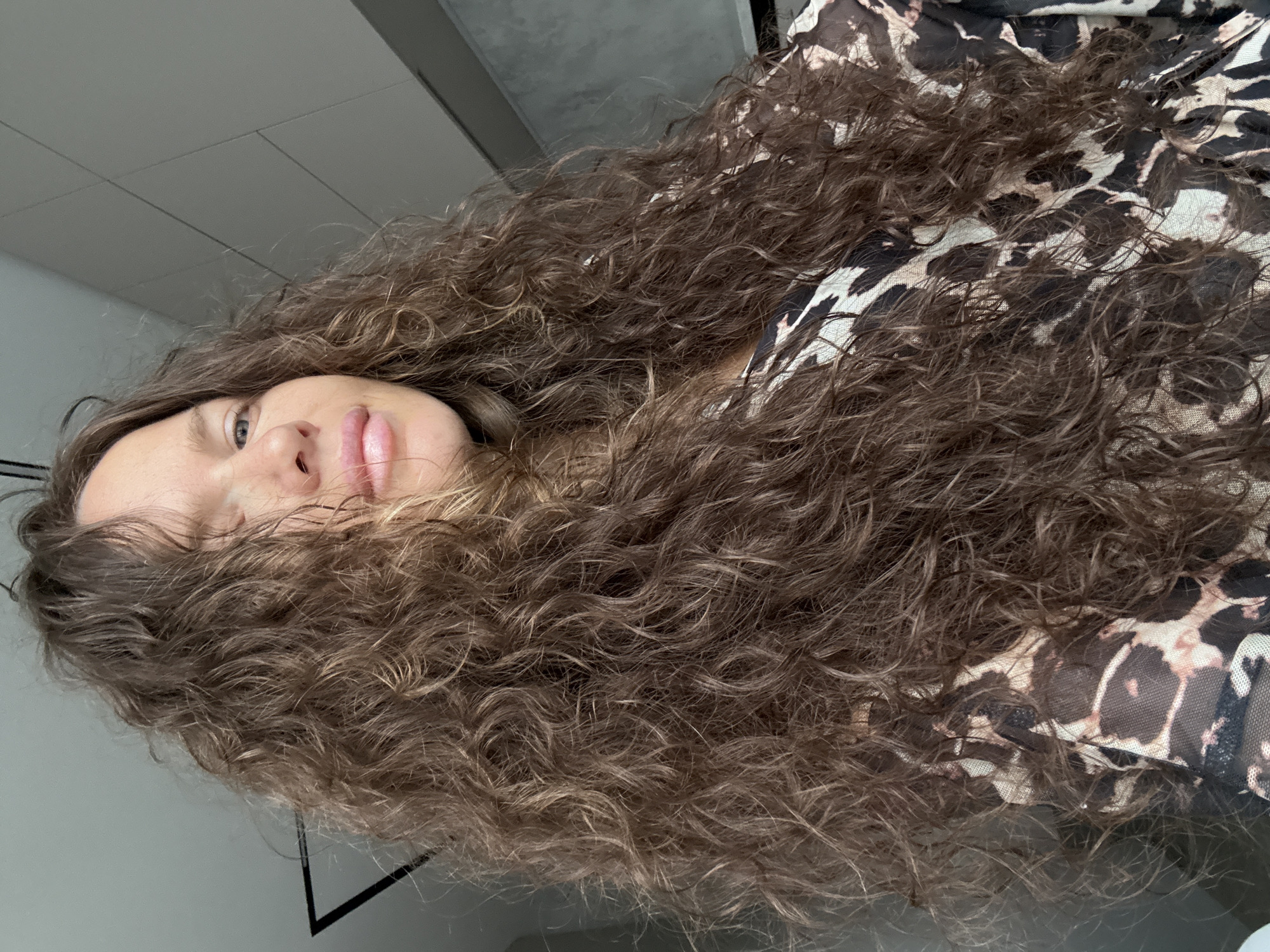 Close-up portrait with curly hair and leopard print, Khimki