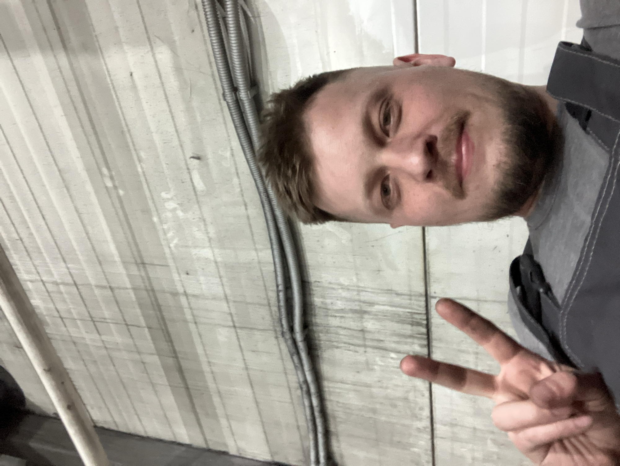 Worker takes selfie with peace sign in Noviy facility