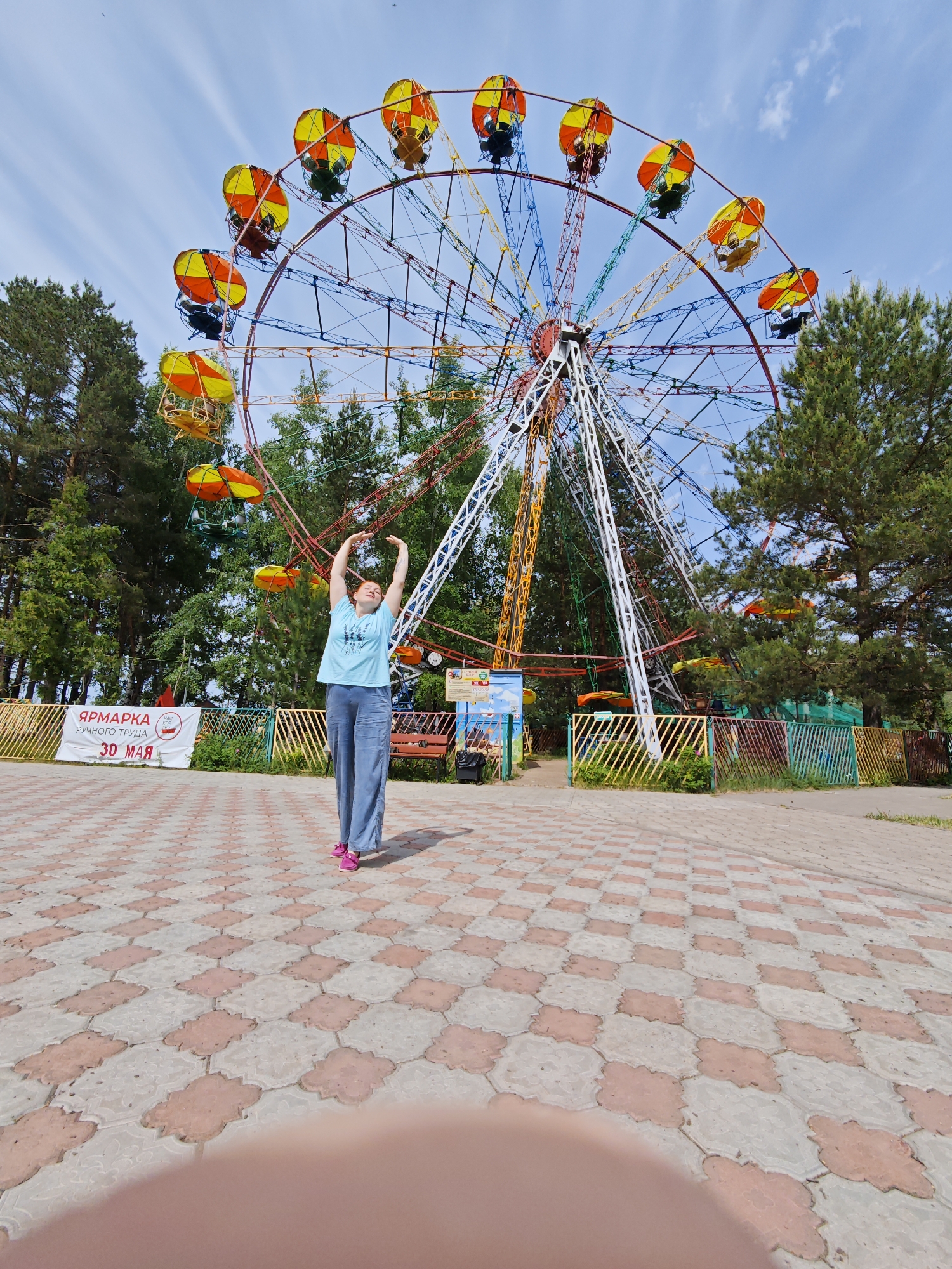 Mother and child enjoy morning at Chaikovsky fairground