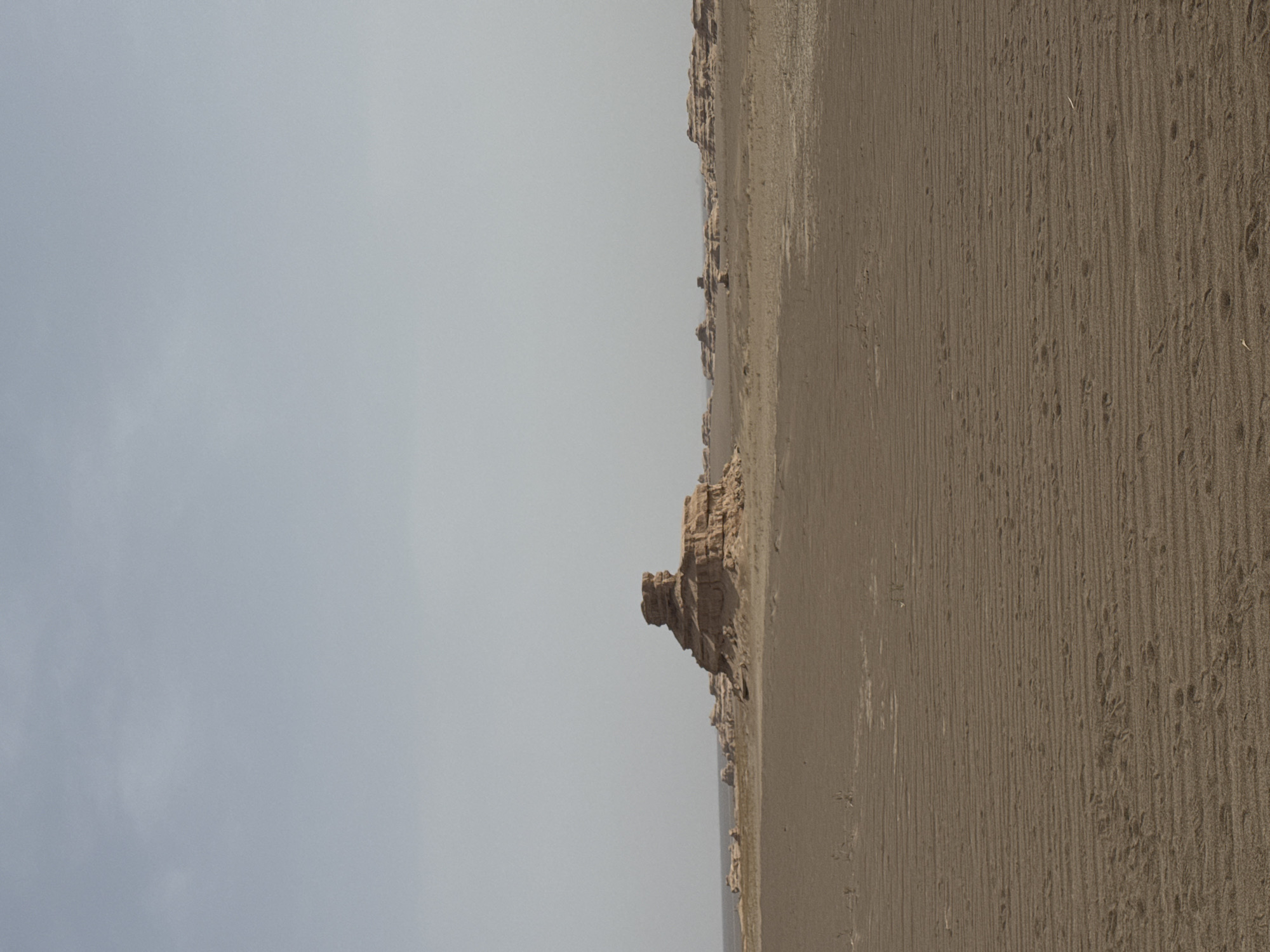 Desert landscape with yardang formations documented in Dunhuang, China
