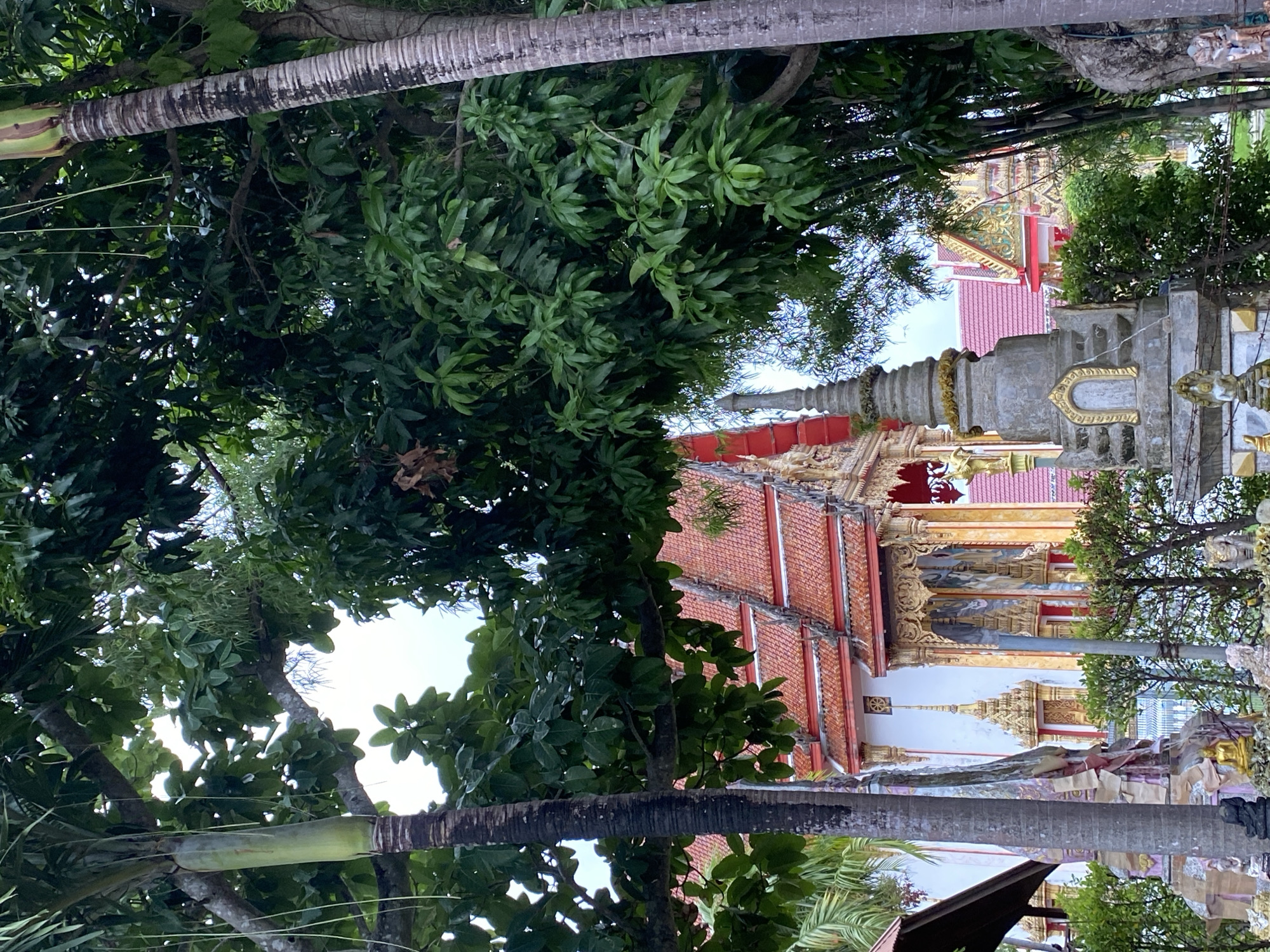 Buddhist temple with evacuation signage documented in Choeng Thale