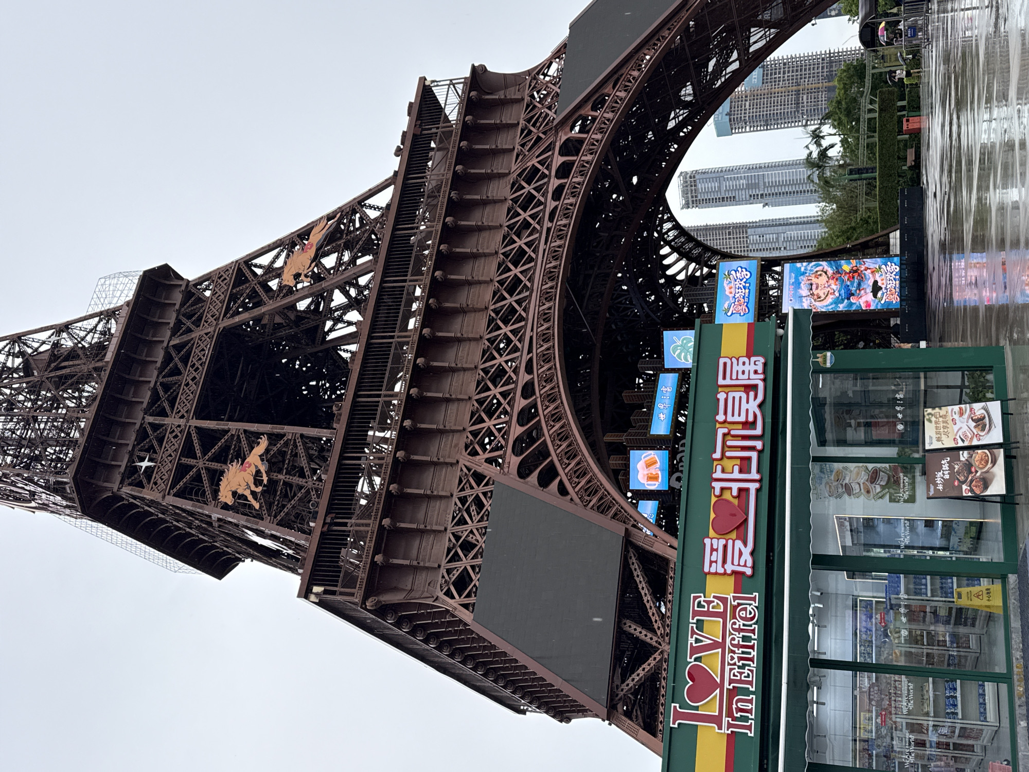 Replica Eiffel Tower and a NAVIAI humanoid robot in Nanshan District