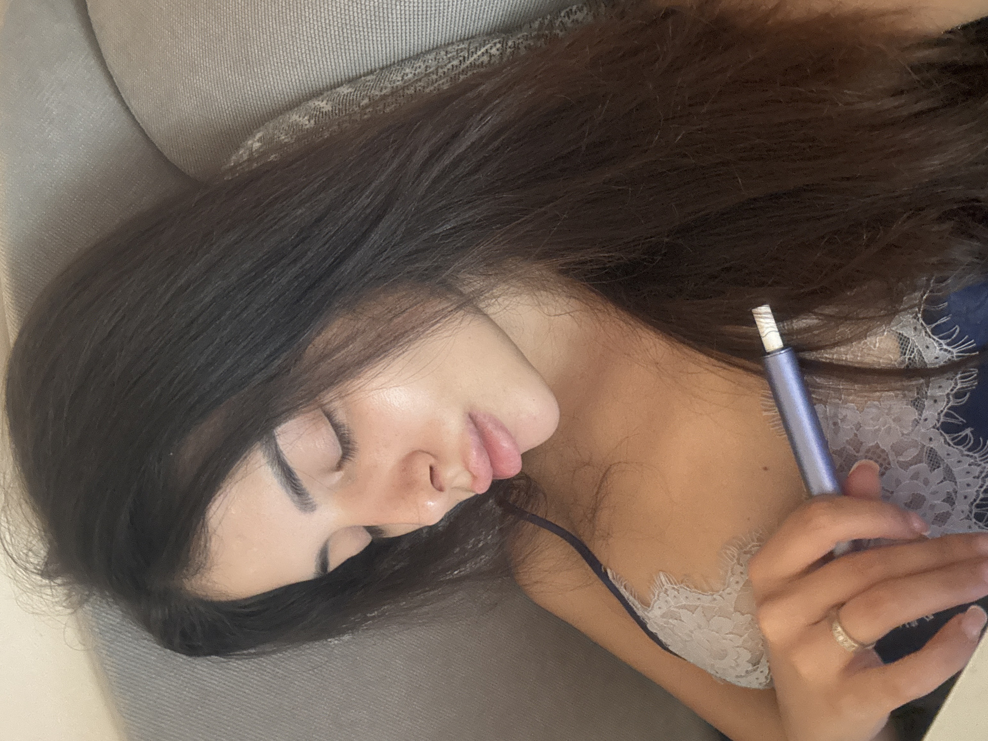 Relaxing on a sofa with a laptop and vape, Plovdiv