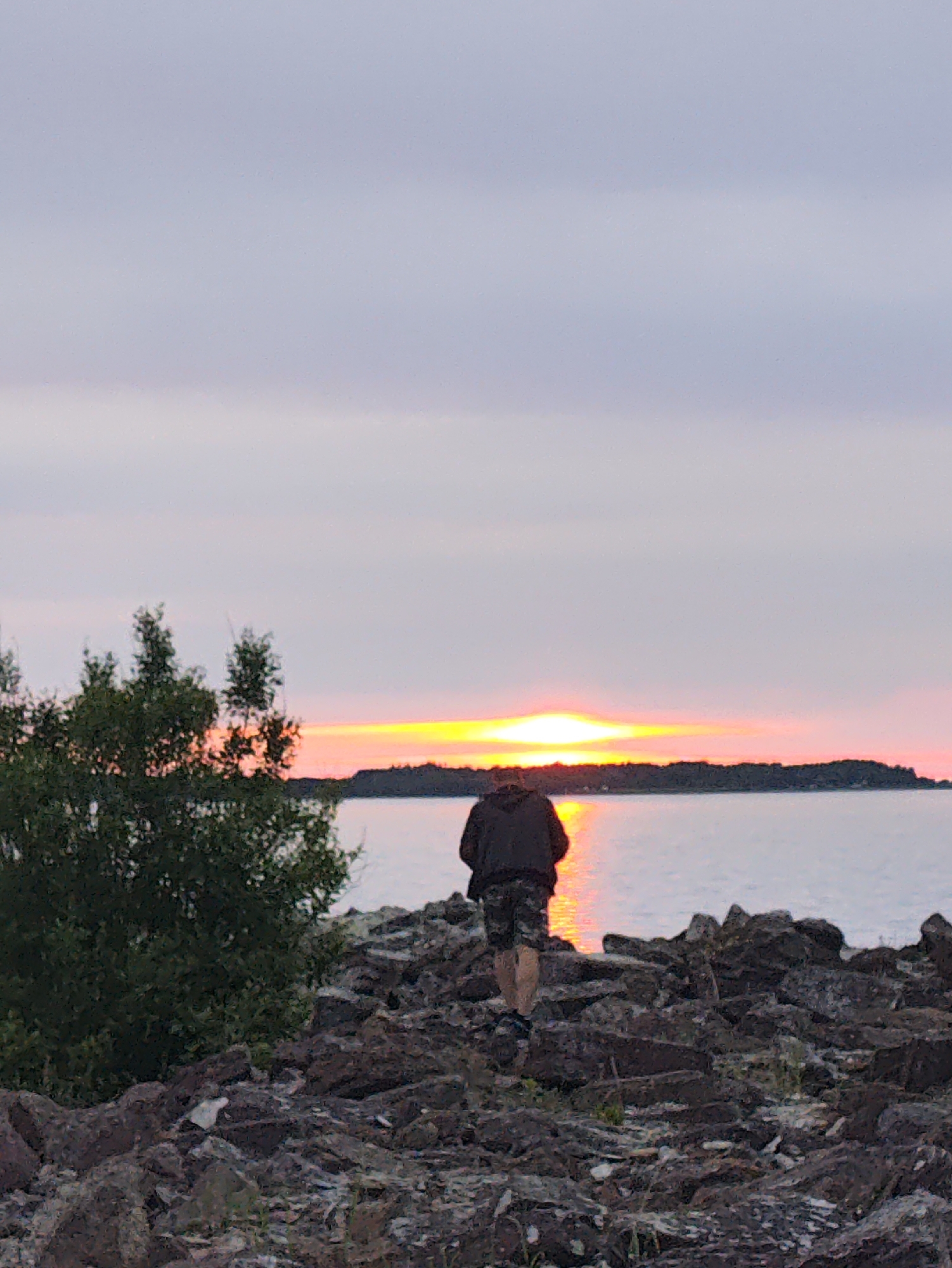 Sunset observer documents evening at Tallinn Port waterfront