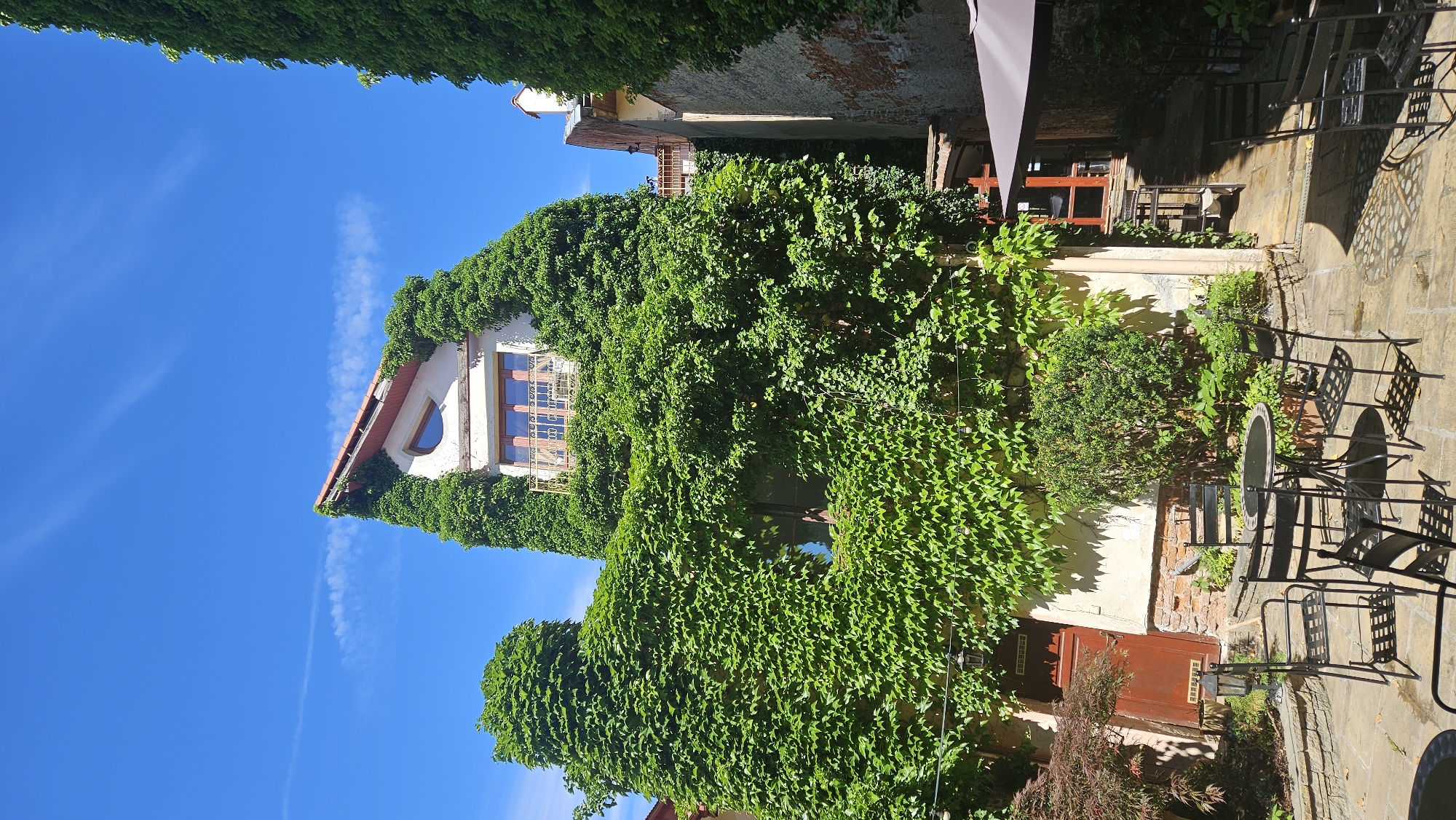 Afternoon stroll through historic Prešov city center streets and cafes