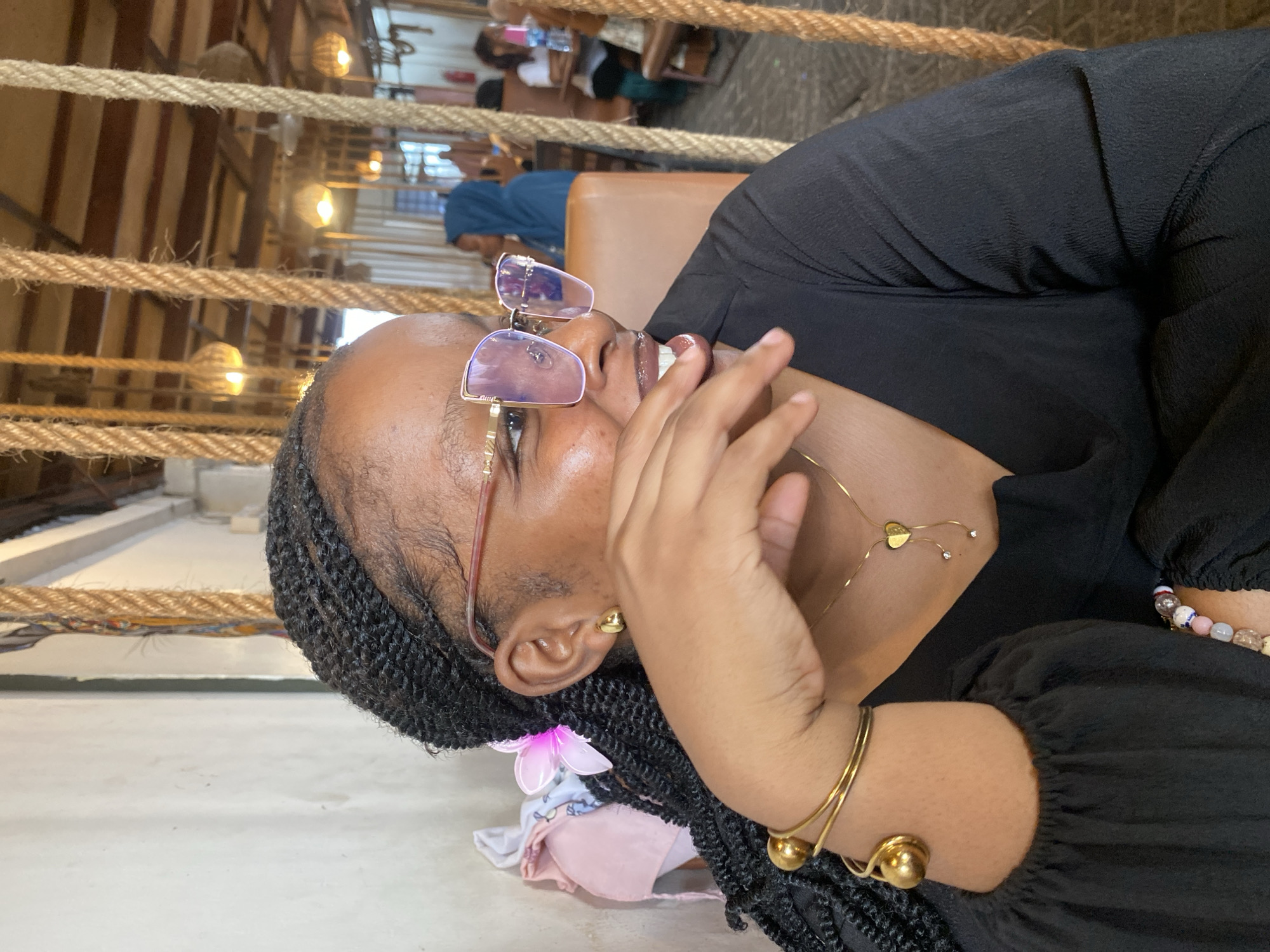 Woman photographed at café in Dar es-Salaam, Tanzania