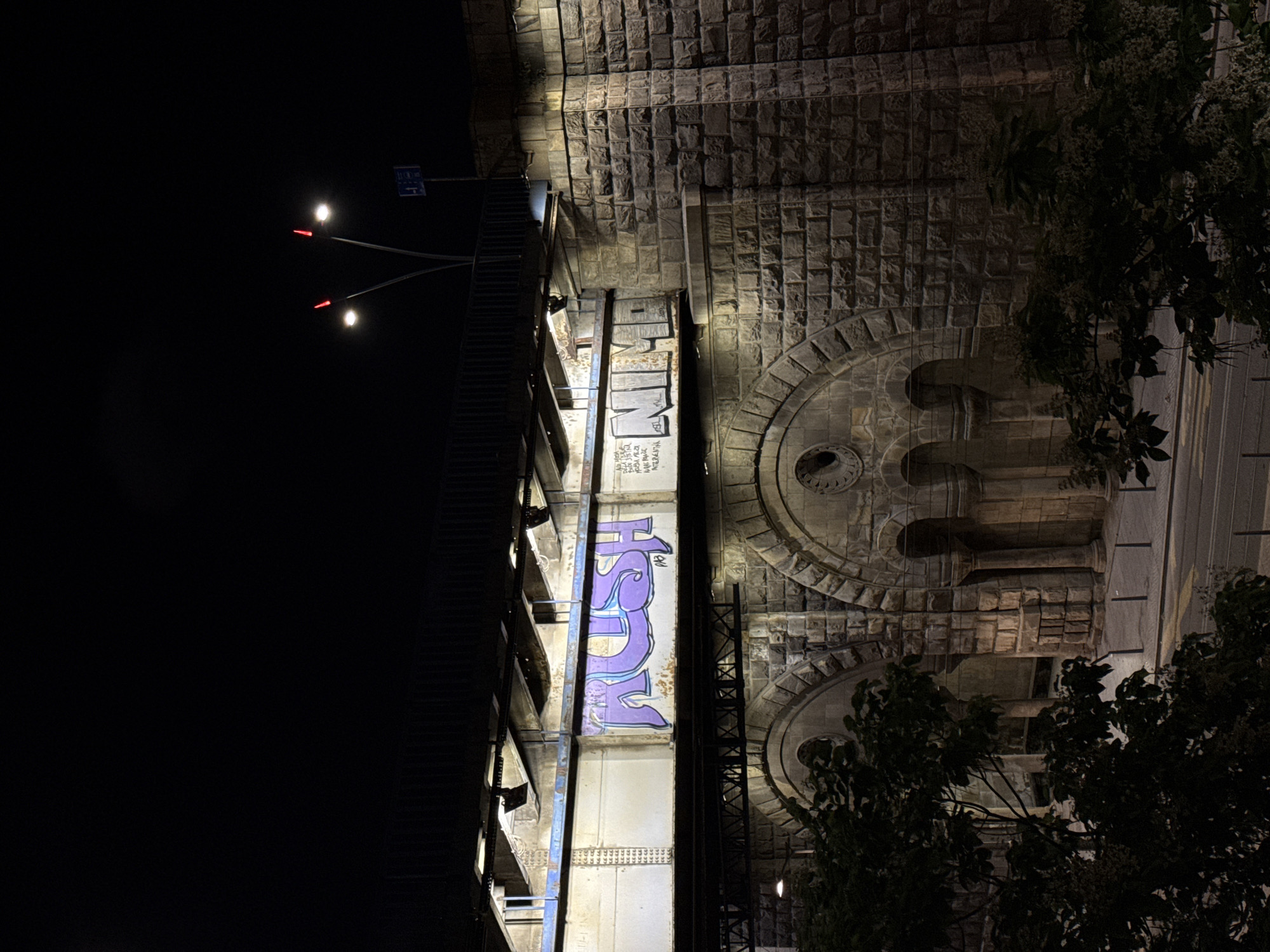Nighttime documentation of Belgrade architecture and street art