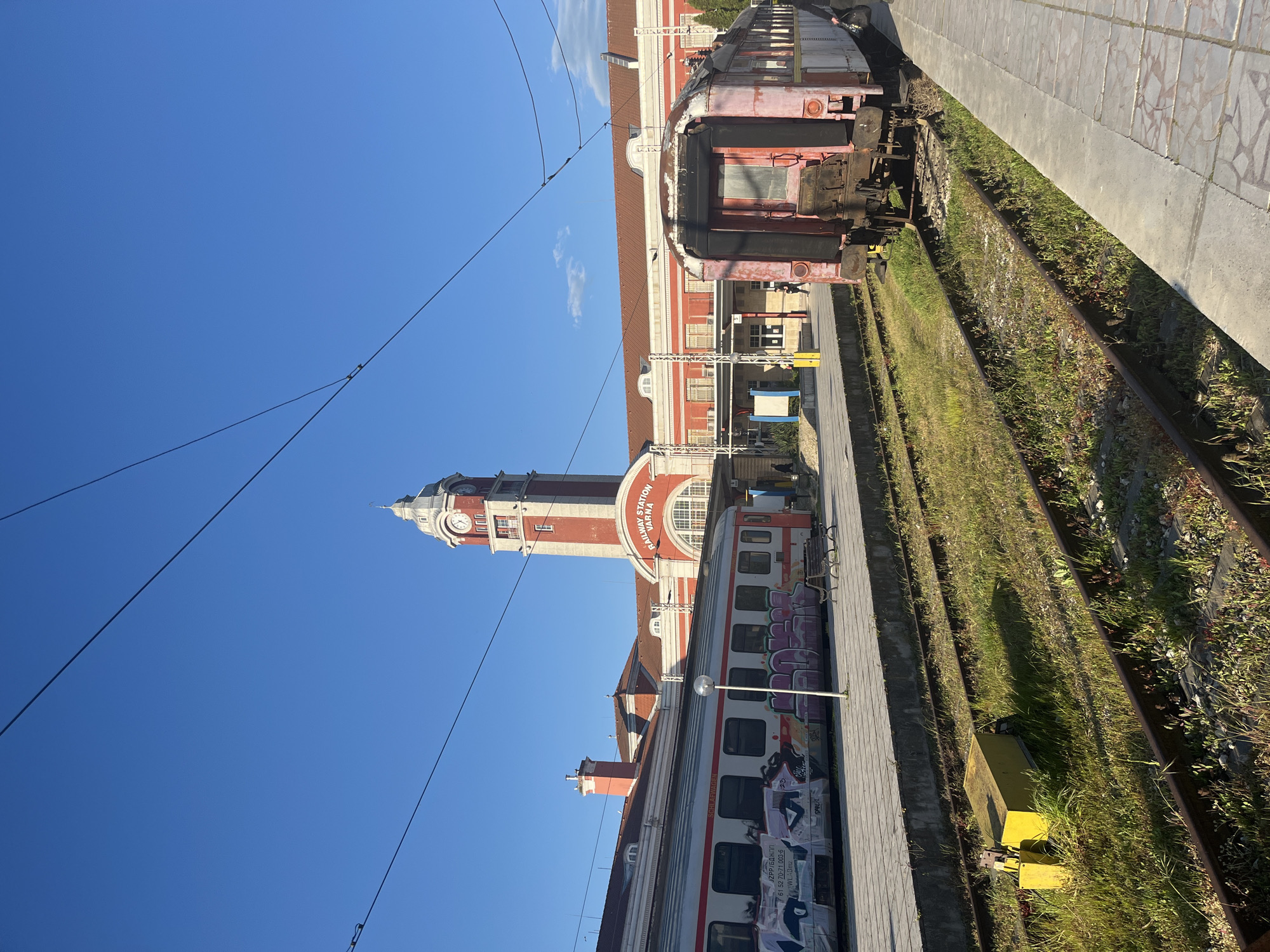 Trains spotted at Varna Railway Station under clear skies