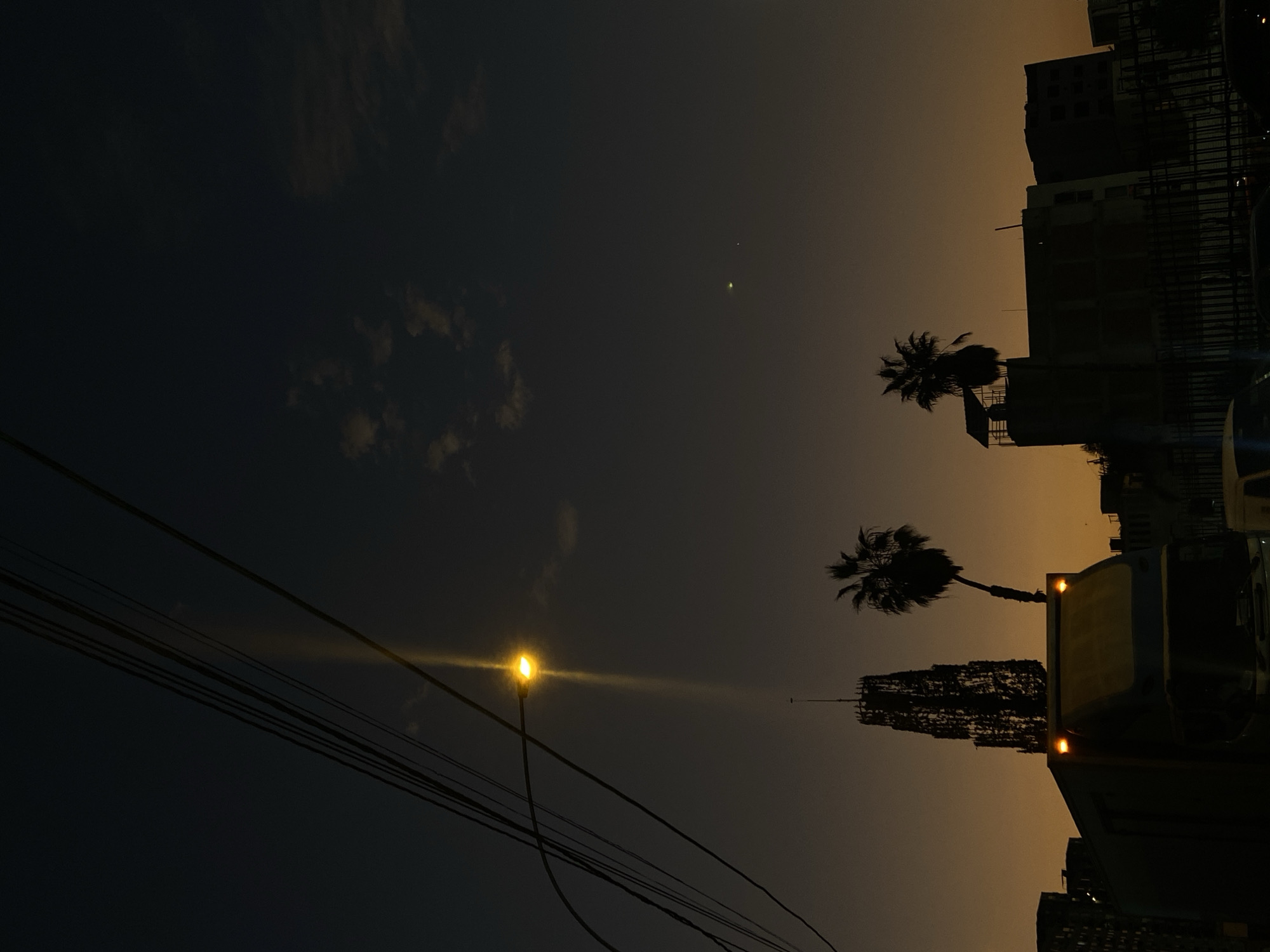 Twilight scene documented in San Miguel, Peru street