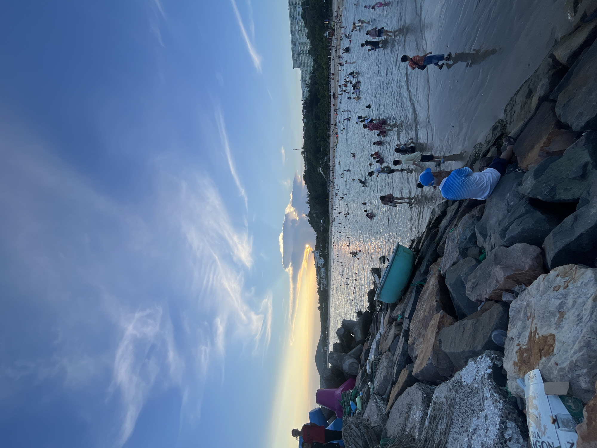 Sunset crowd at Phu Thuy Ward beach, Vietnam
