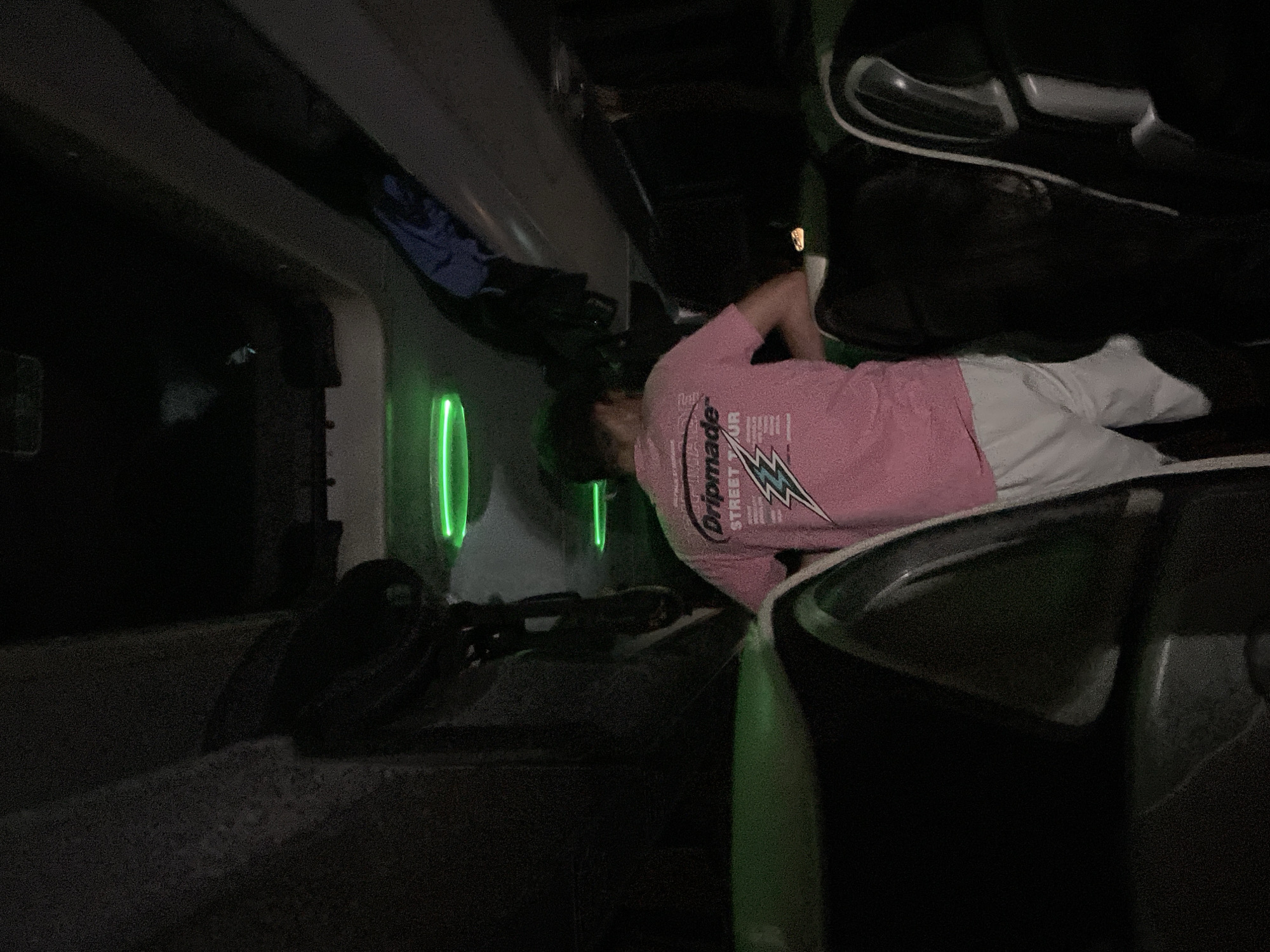 Night bus passengers observed resting during Bulgarian countryside journey