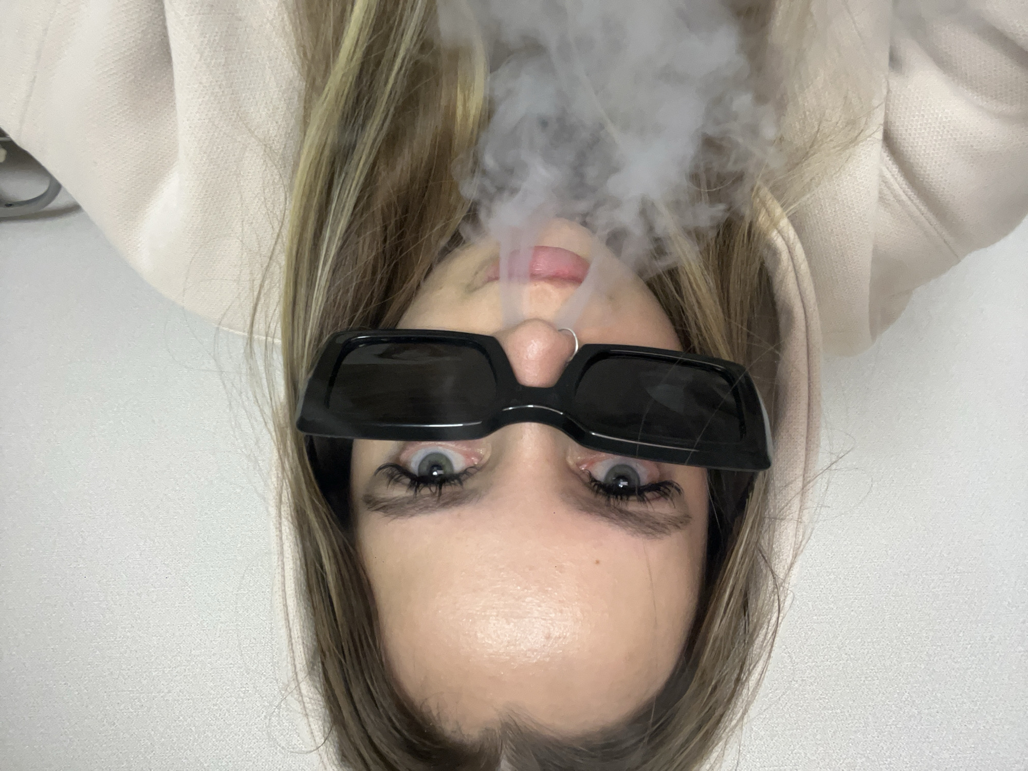 Portrait photos captured in Krasnodar show person exhaling vapor
