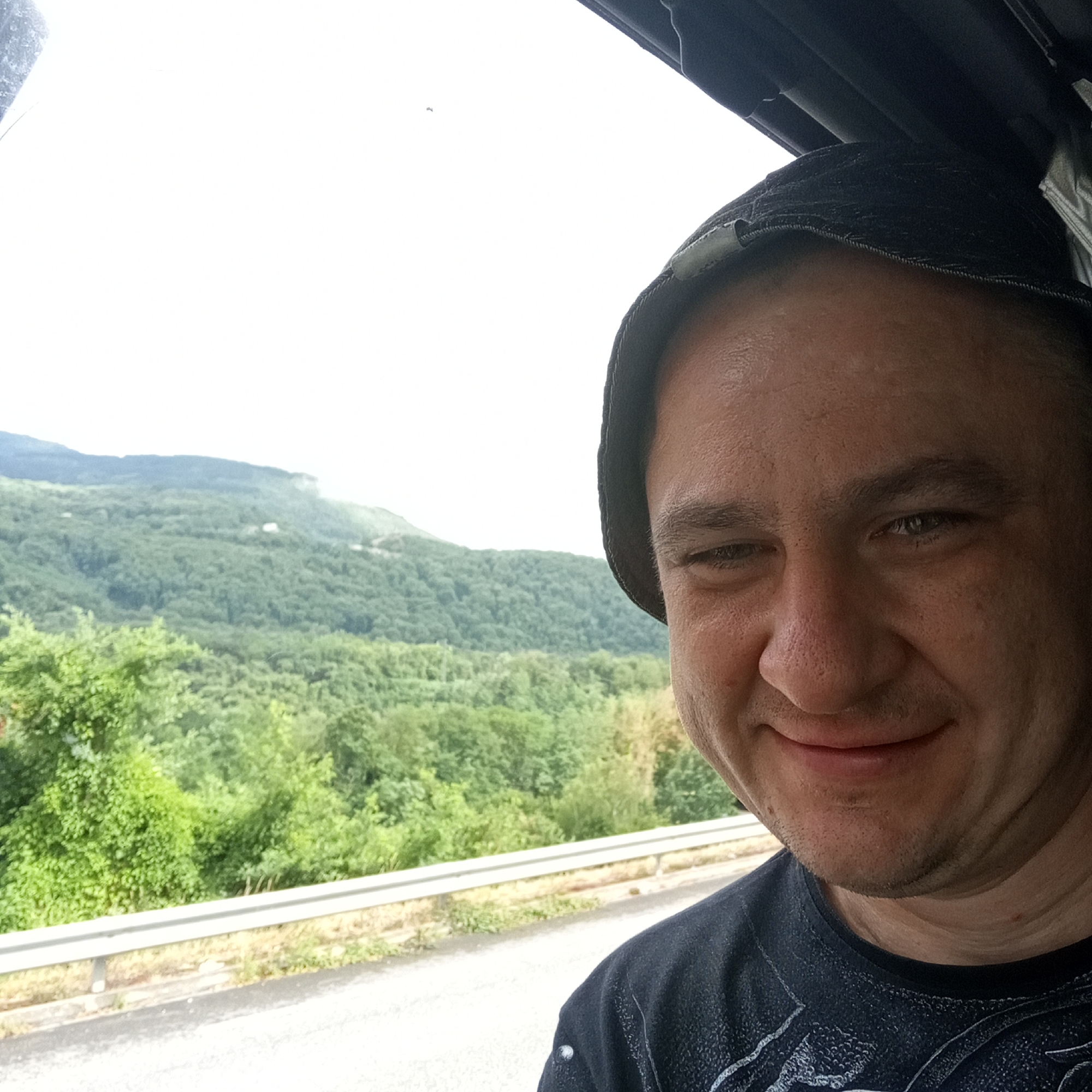 Selfie stop in the Ariège hills with Pyrenees views