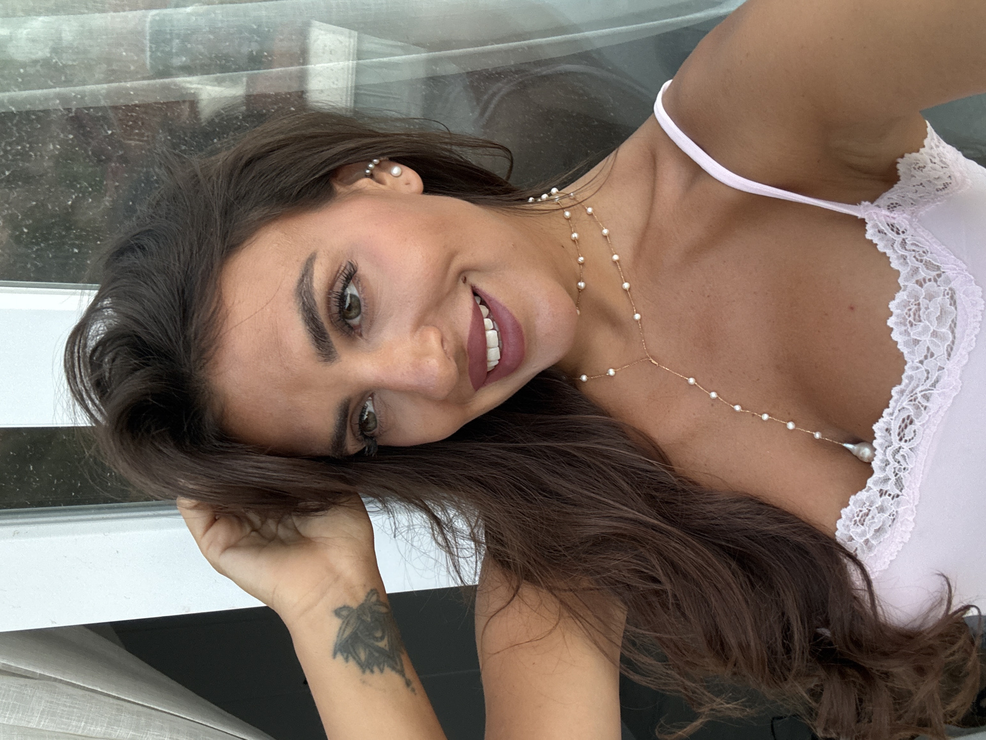 Balcony selfies in Fethiye with a hillside backdrop