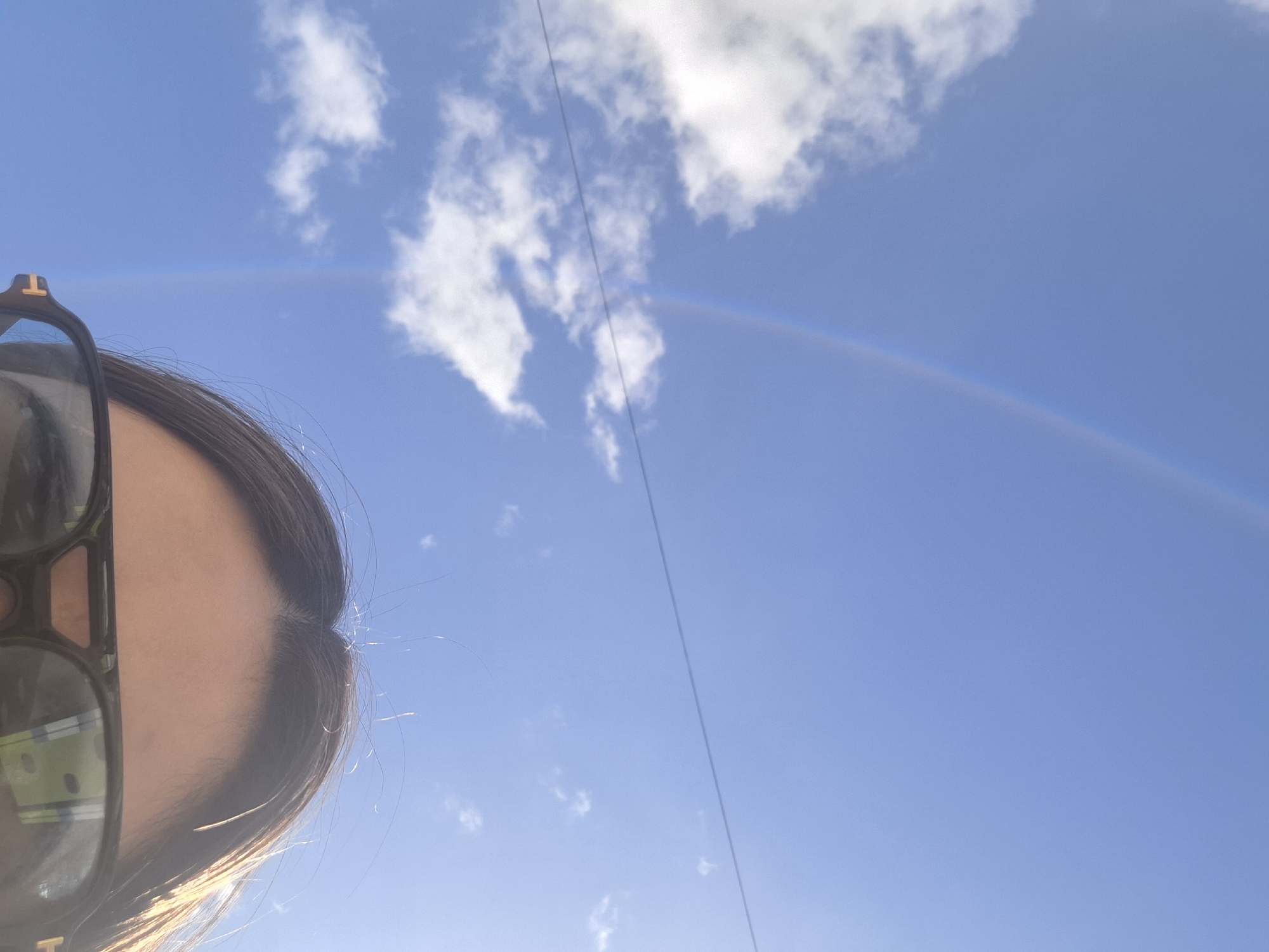 Playground moments captured in Chaikovsky during rainbow weather