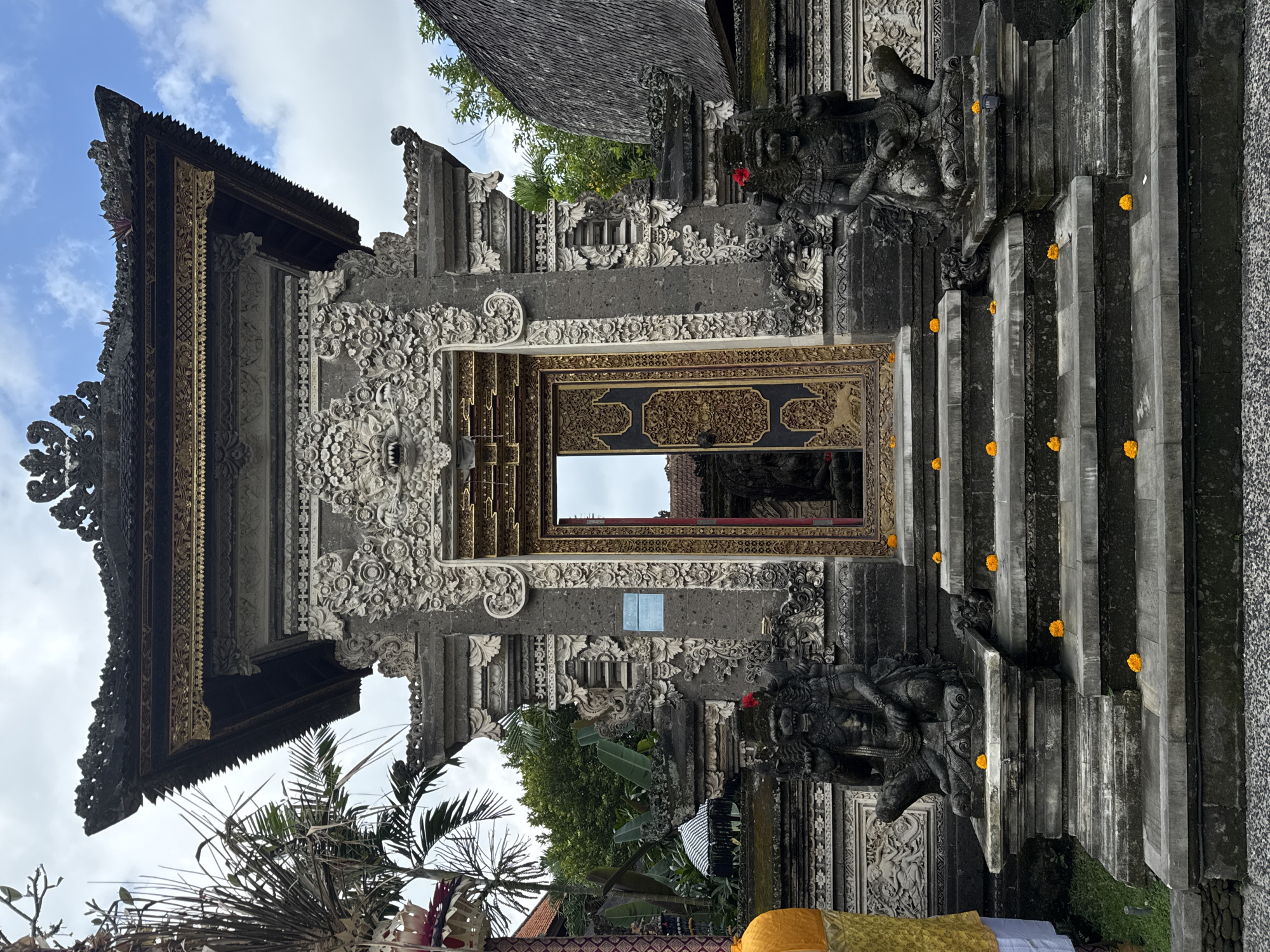 Temple statues, carvings, and street details across Ubud