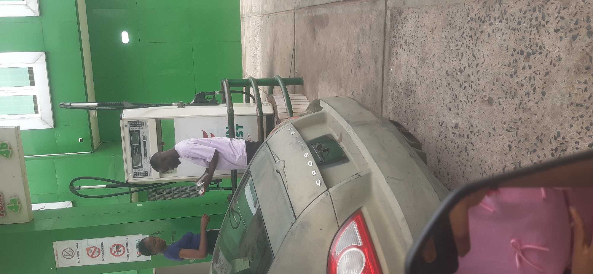 Ordinary daytime moments captured at Onitsha gas station, streets