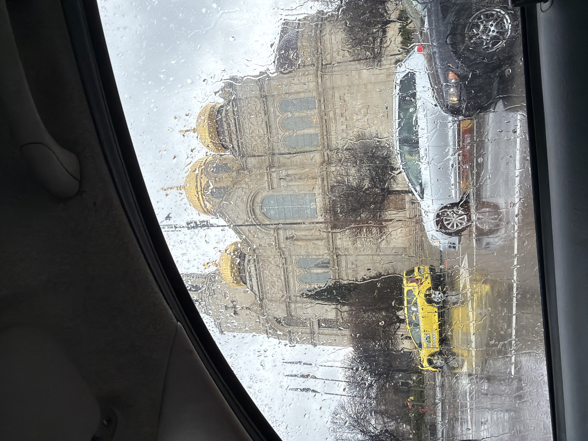Rainy day observations of Varna cathedral and street scene