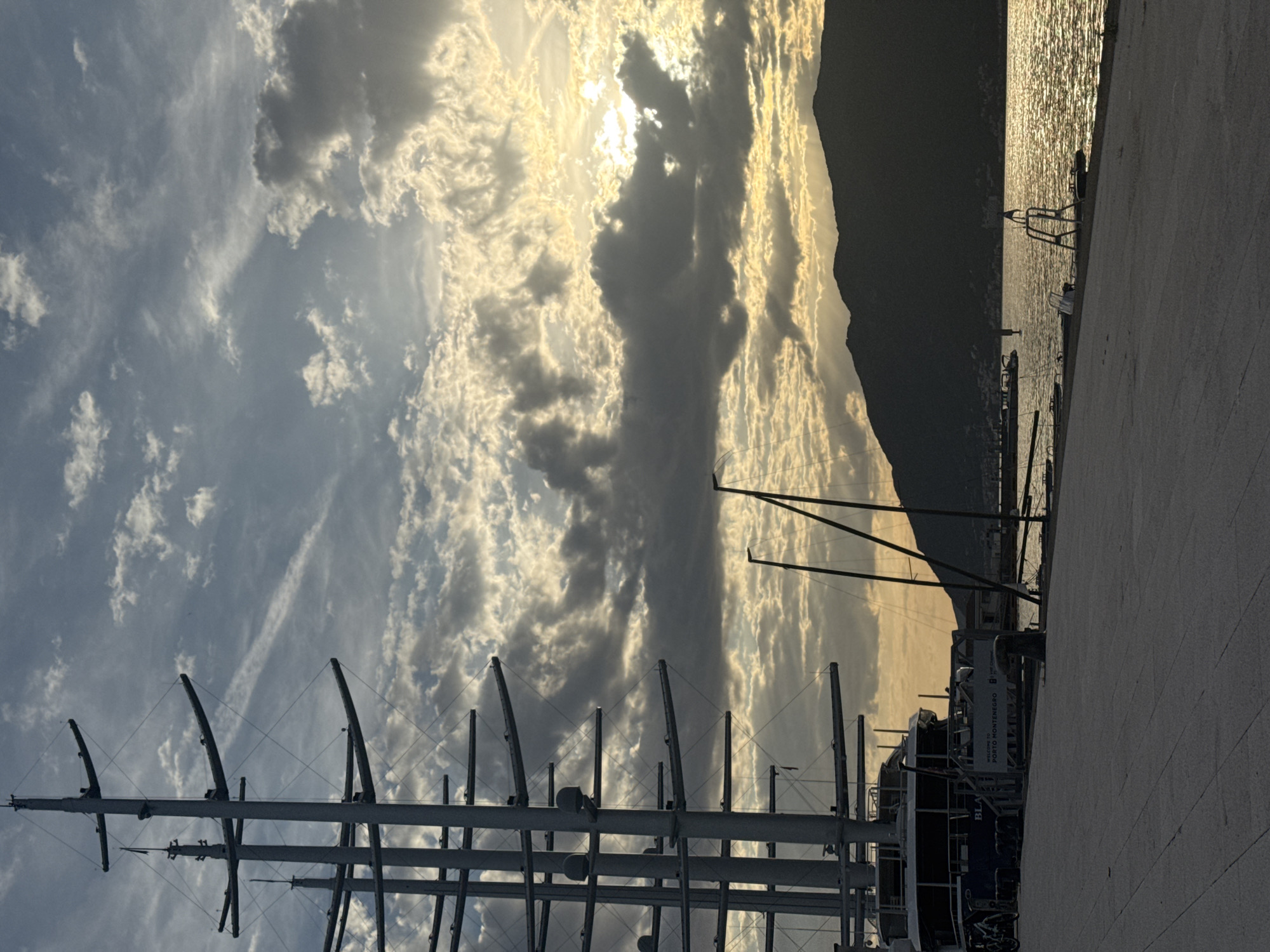 Evening stroll documented at Porto Montenegro marina during golden hour