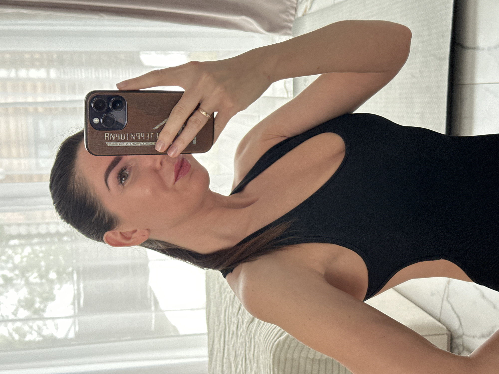Morning selfie and branded water bottle captured in Chaikovsky