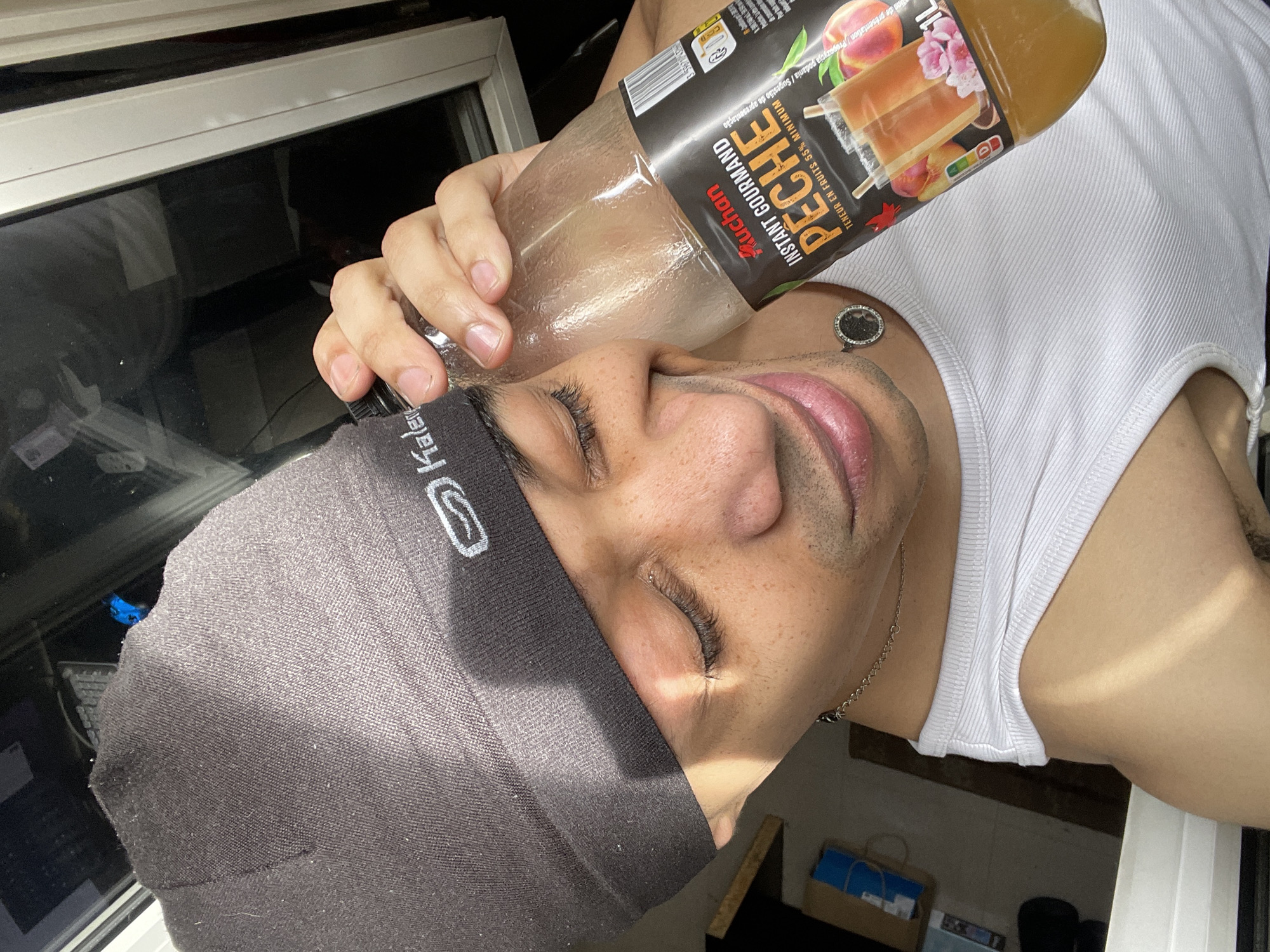 Young man takes indoor selfies in Plaisir, France