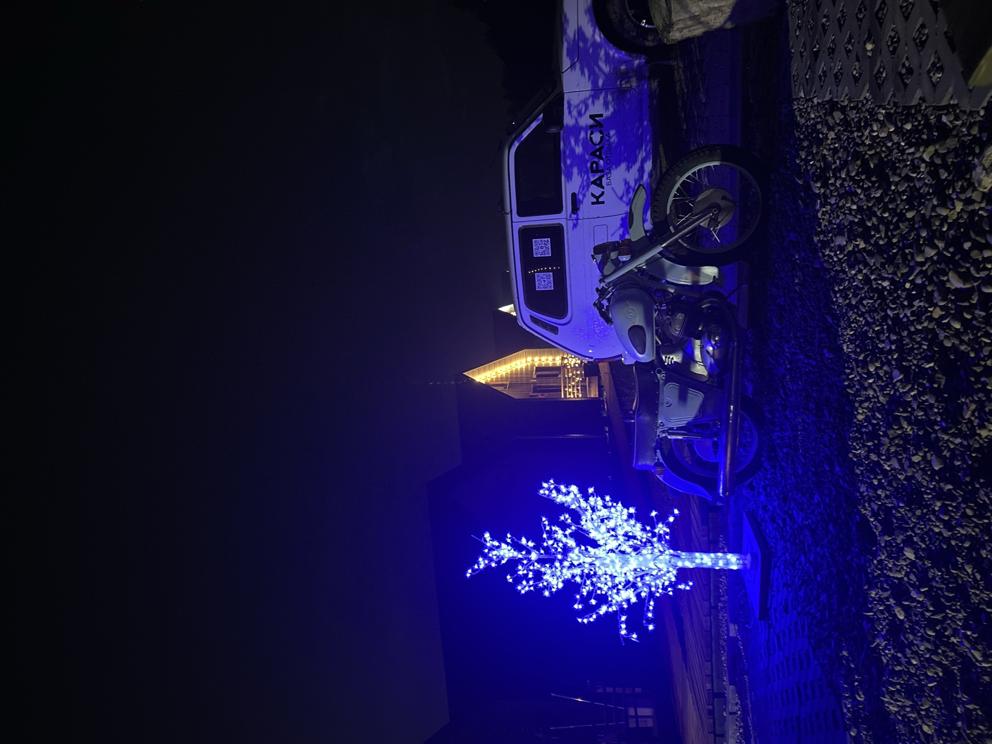 Nighttime scenes documented in Pirogovo, Russia show illuminated buildings