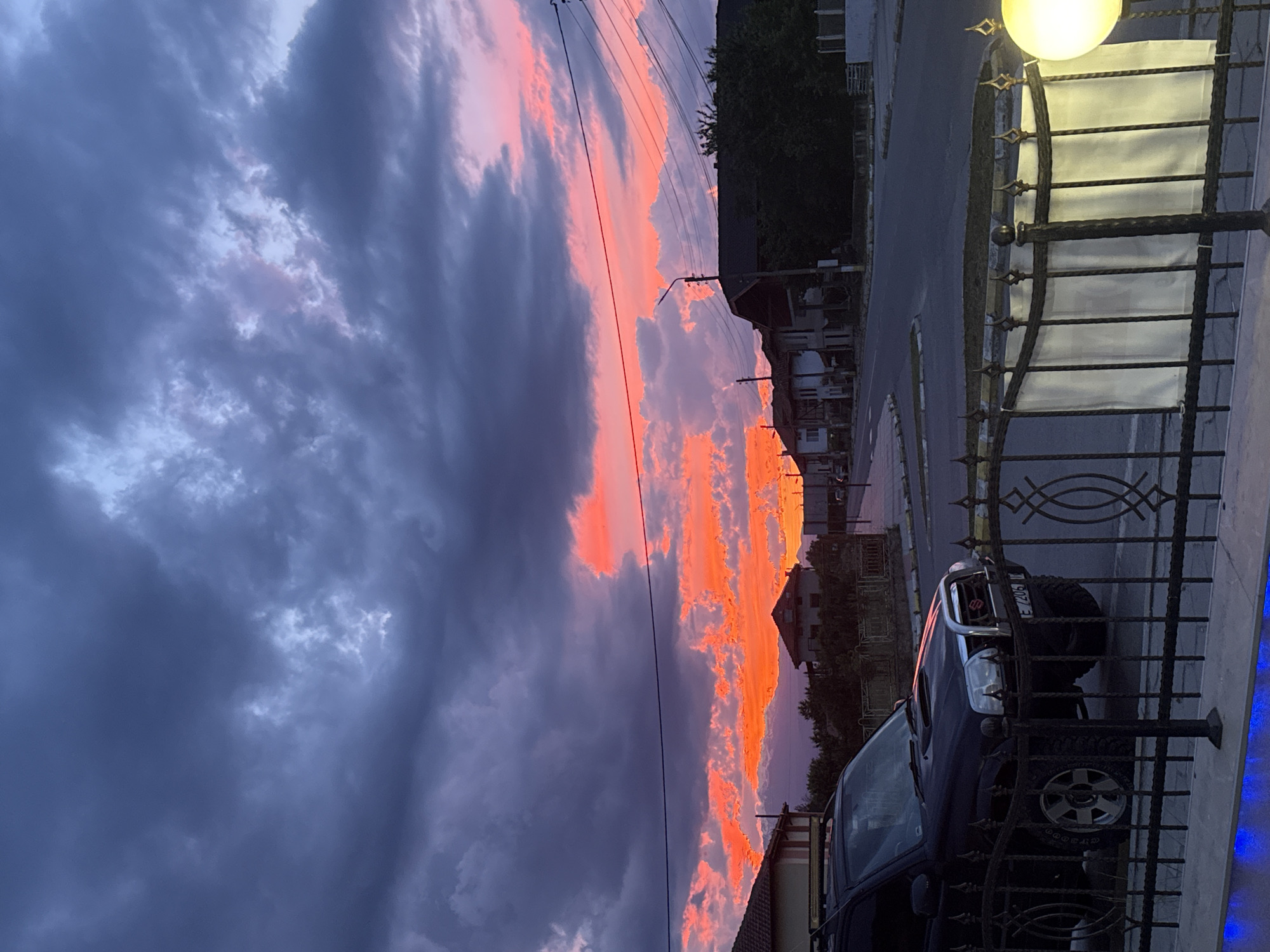 Dramatic sunset illuminates Blatska, Bulgaria amid storm clouds