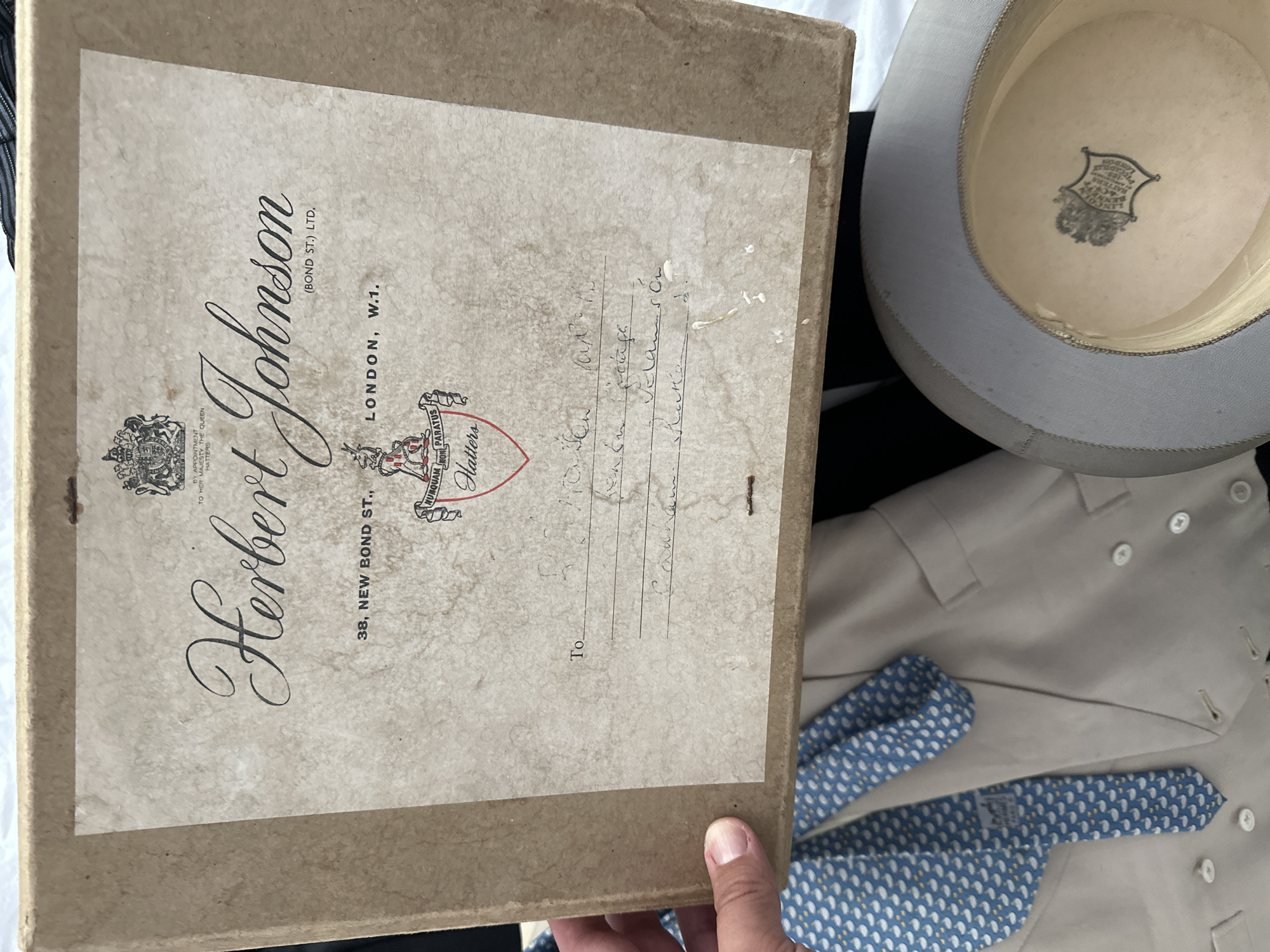 Individual prepares Victorian formal wear for London racecourse event