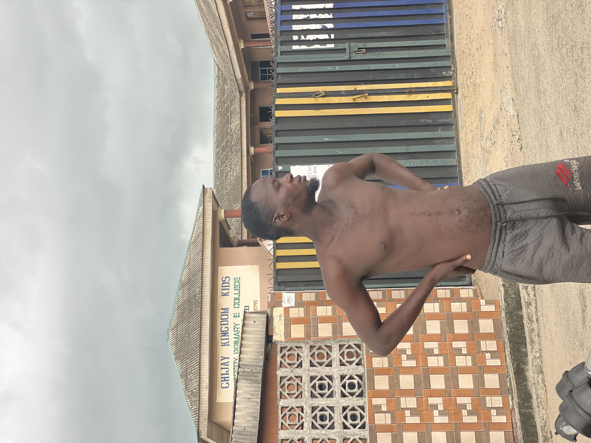 Morning life documented across Badagry, Nigeria under overcast skies