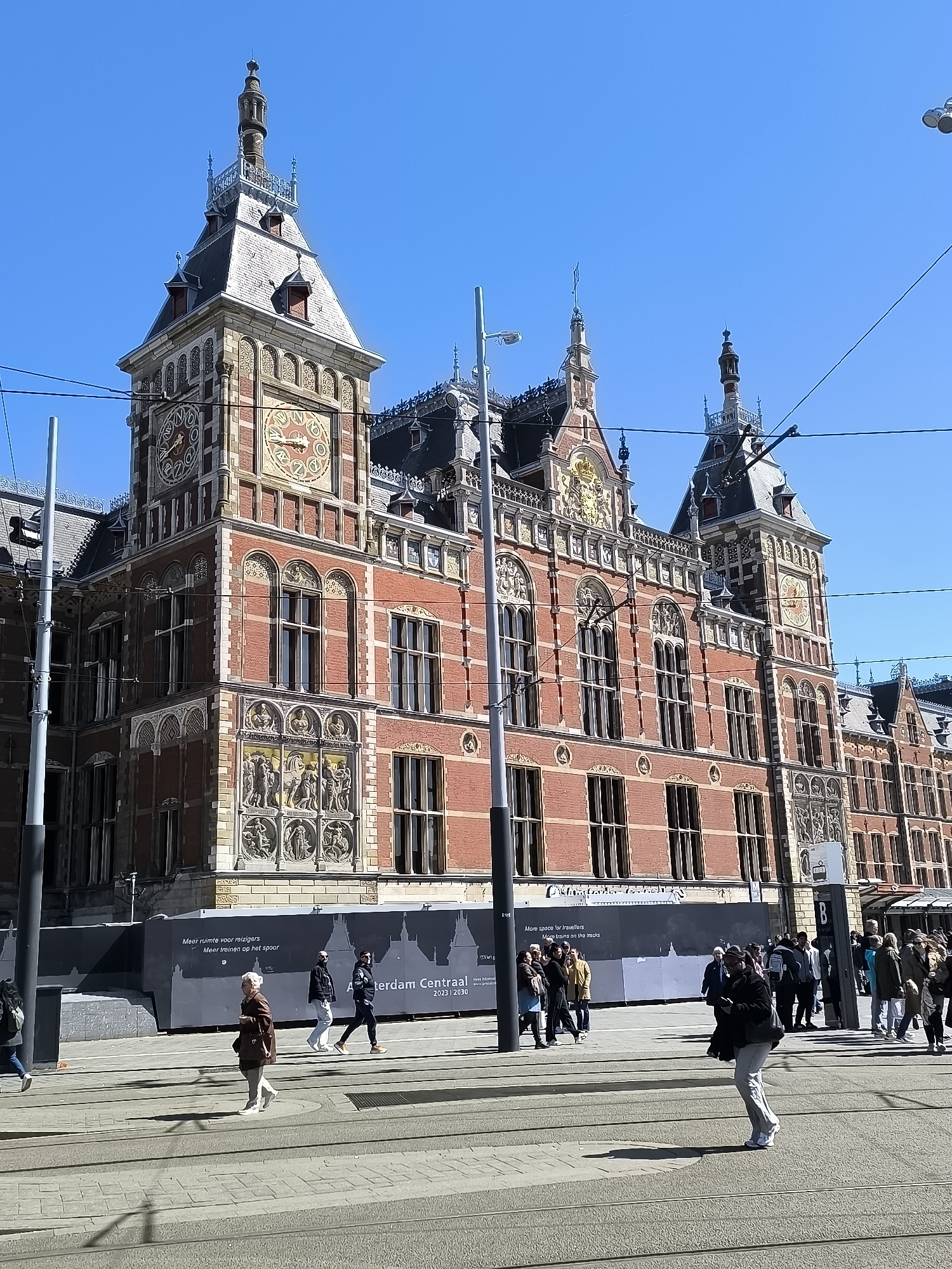 Typical Saturday morning activity captured across Amsterdam city center
