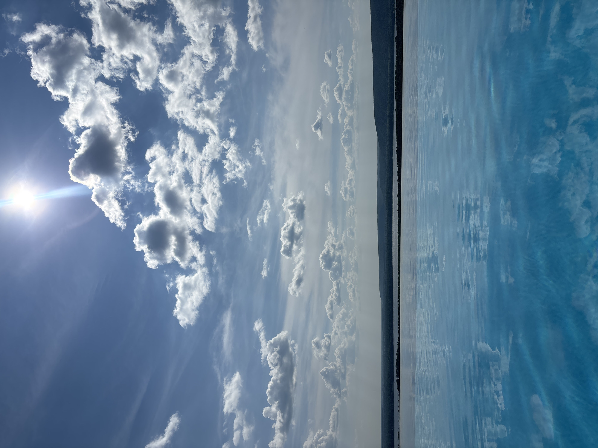 Sunny afternoon at a poolside overlooking the Novokuybyshevsk riverfront
