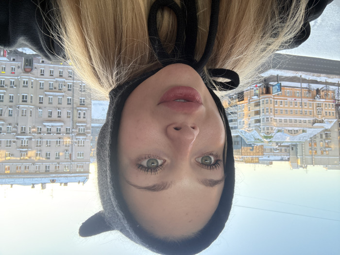 Young Woman Documents Winter Day Across Urban Setting