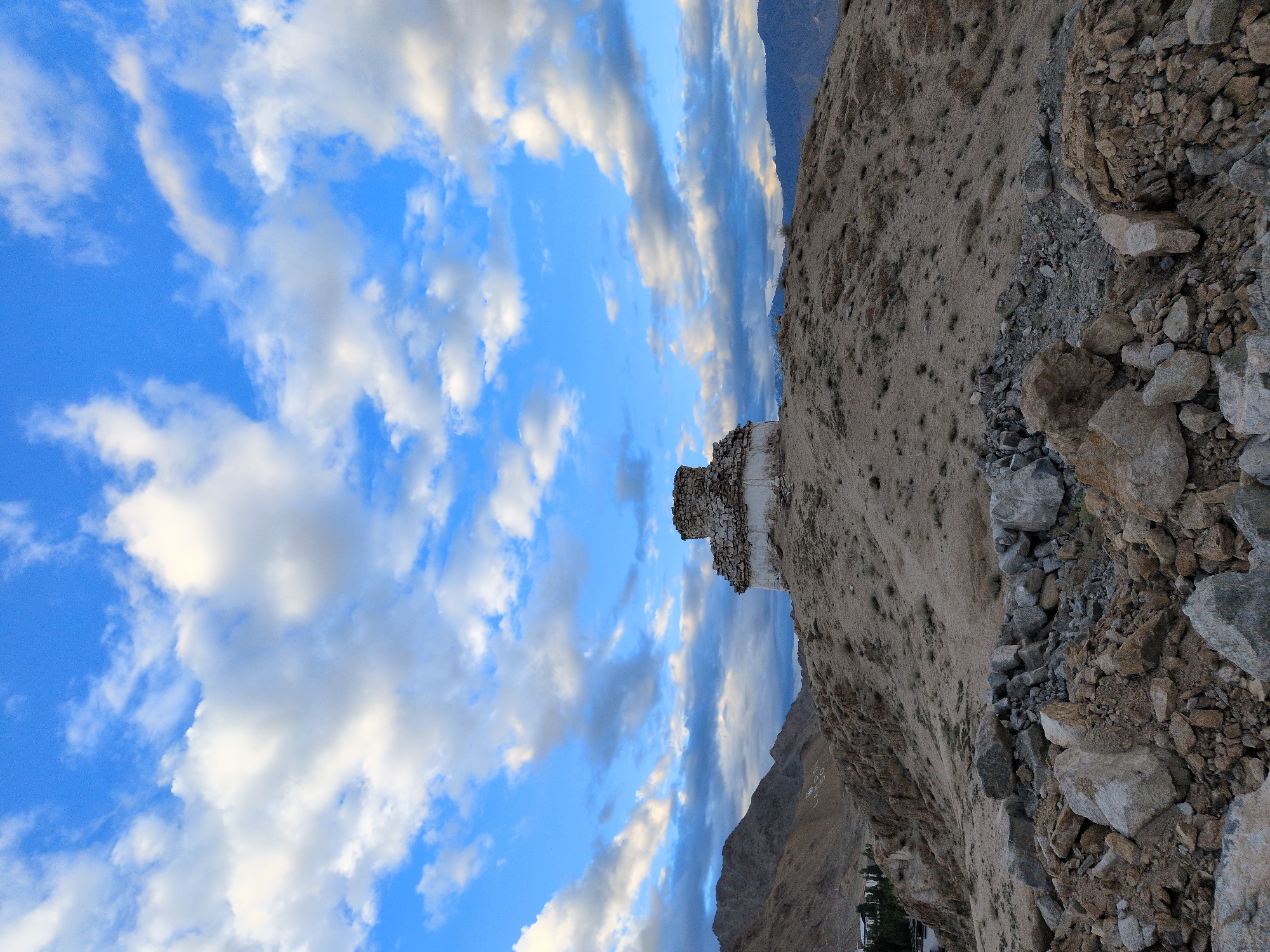 Stupas, statues, and open roads in Leh's high-altitude landscape