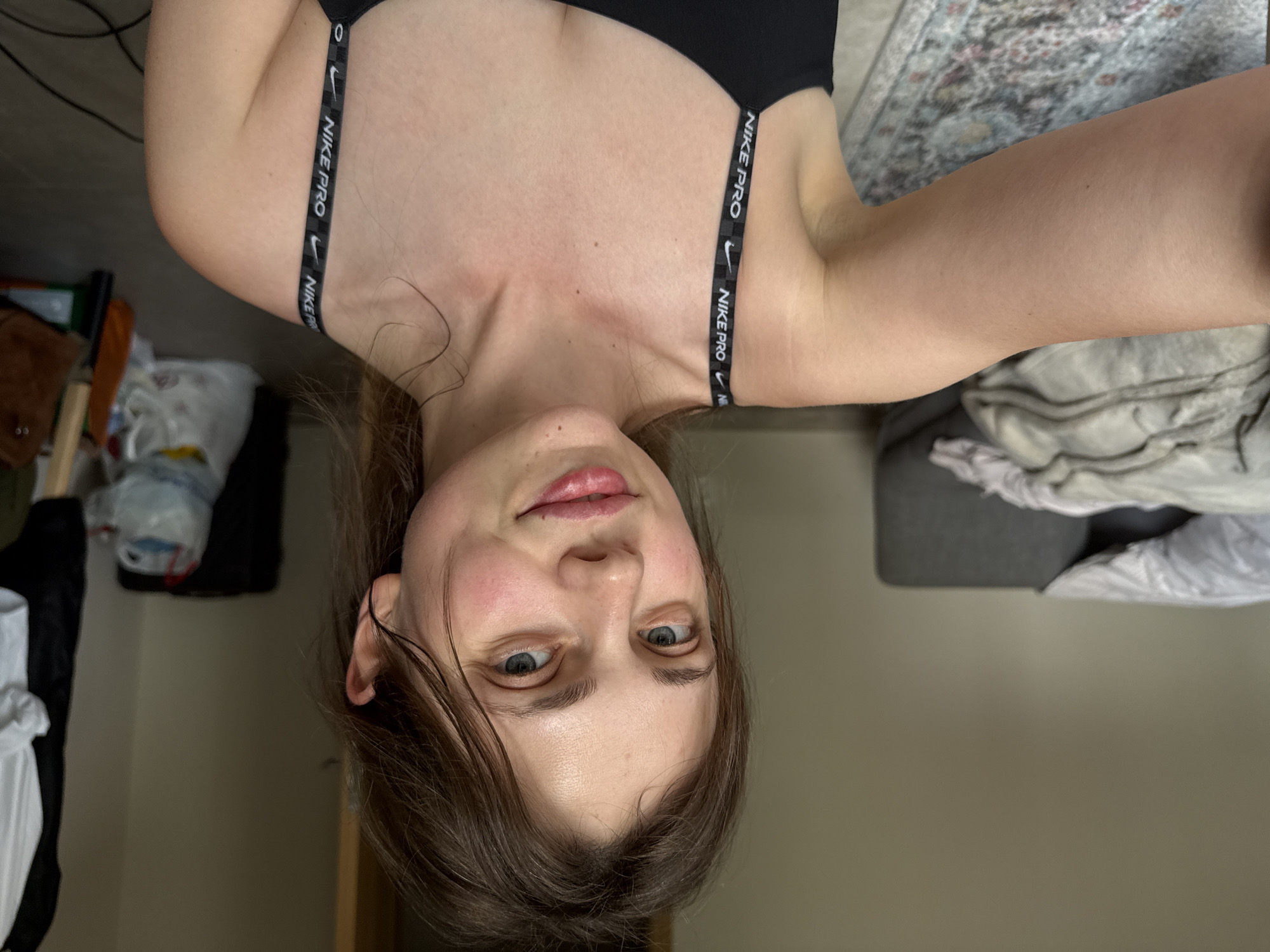 Woman completes indoor yoga session in Karlovy Vary apartment