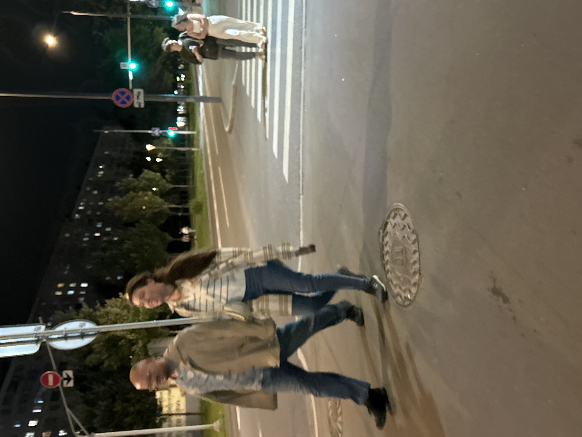 Quiet Moscow street evening, pedestrians and scooters in motion