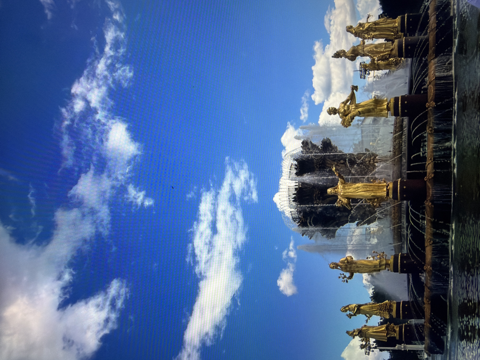 Kotelniki roadside stop: fountain landmark and city skyline approach