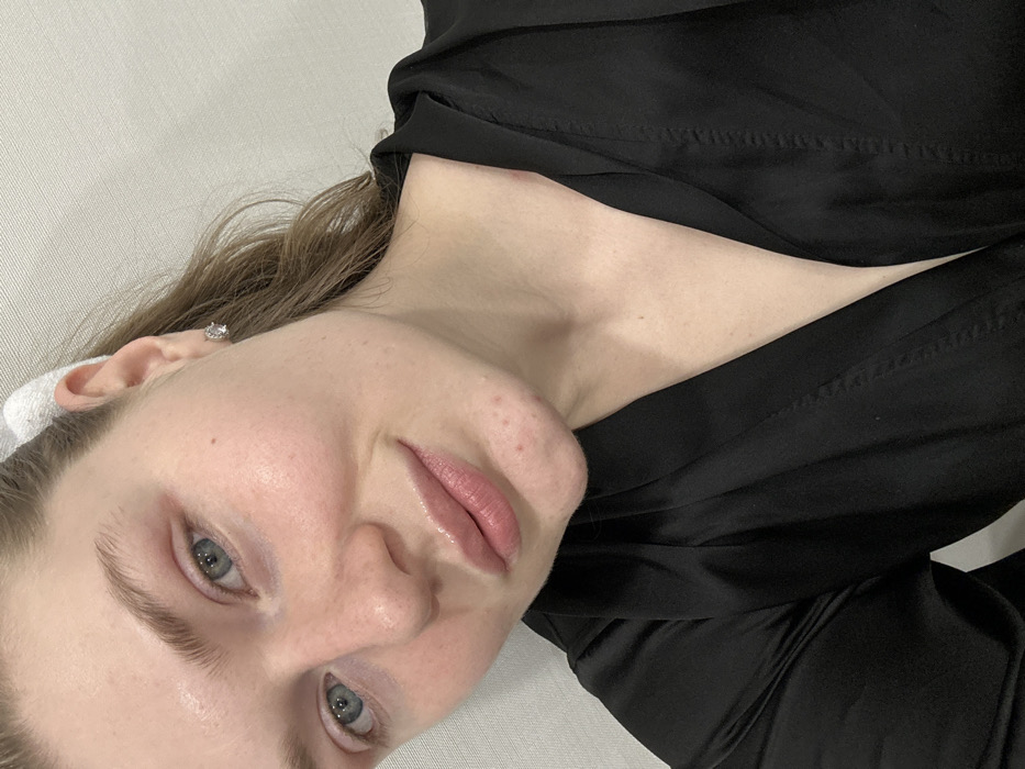 Woman Documents Evening Skincare Routine in Kazan Bathroom
