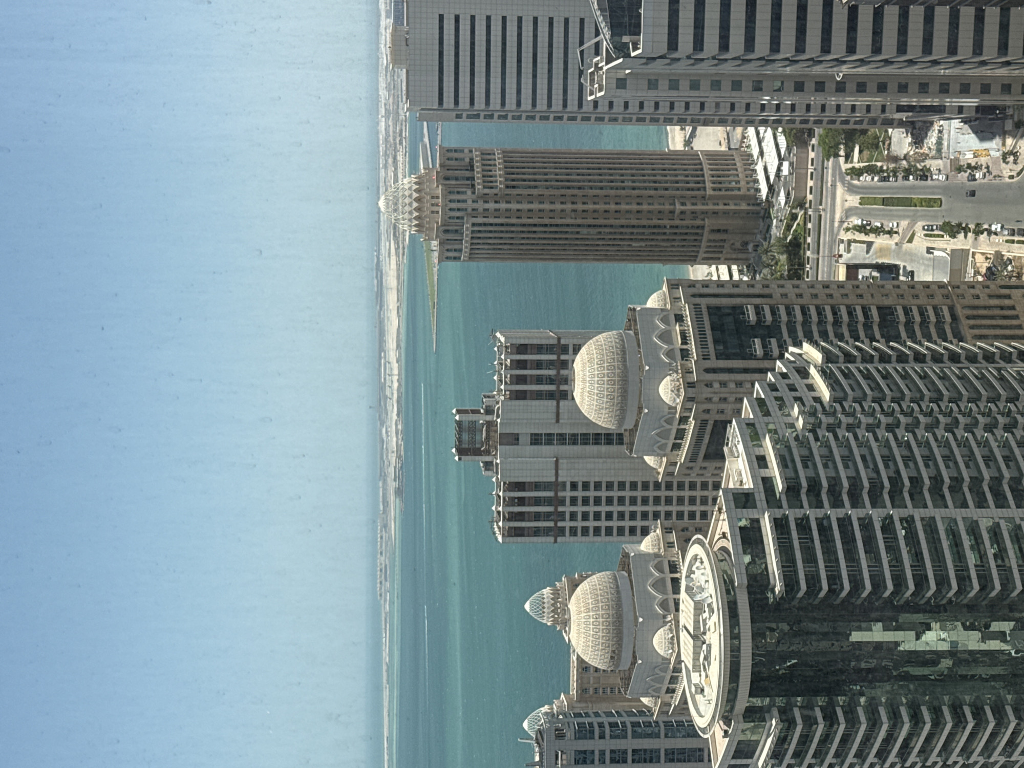Morning skyline views captured from Doha high-rise windows