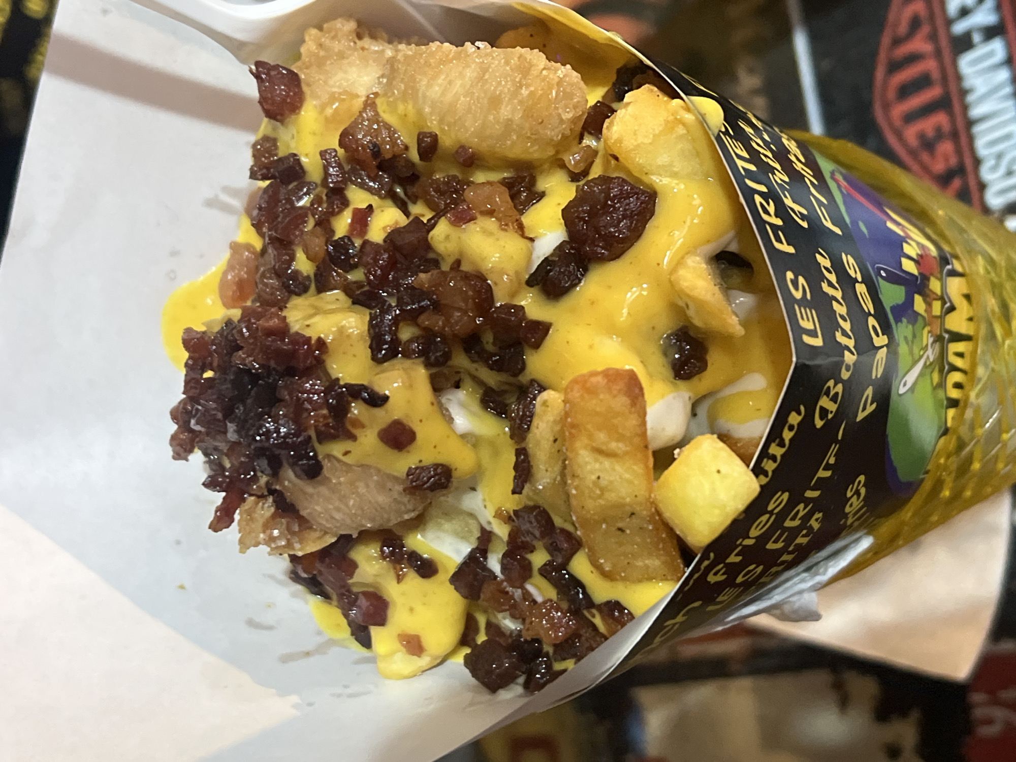 Late-night diners enjoy french fries at outdoor restaurant in Arica