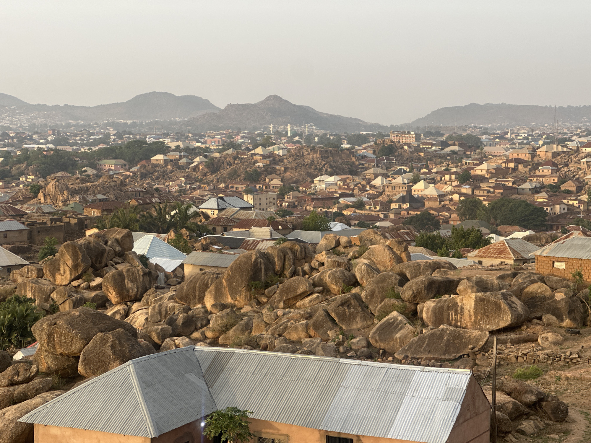 Residential area with distinctive boulder landscape captured in Jos