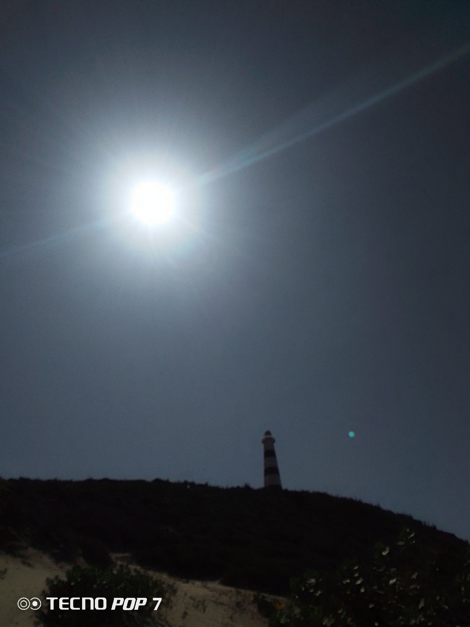 Coastal lighthouse and tropical beach scenes documented by witness