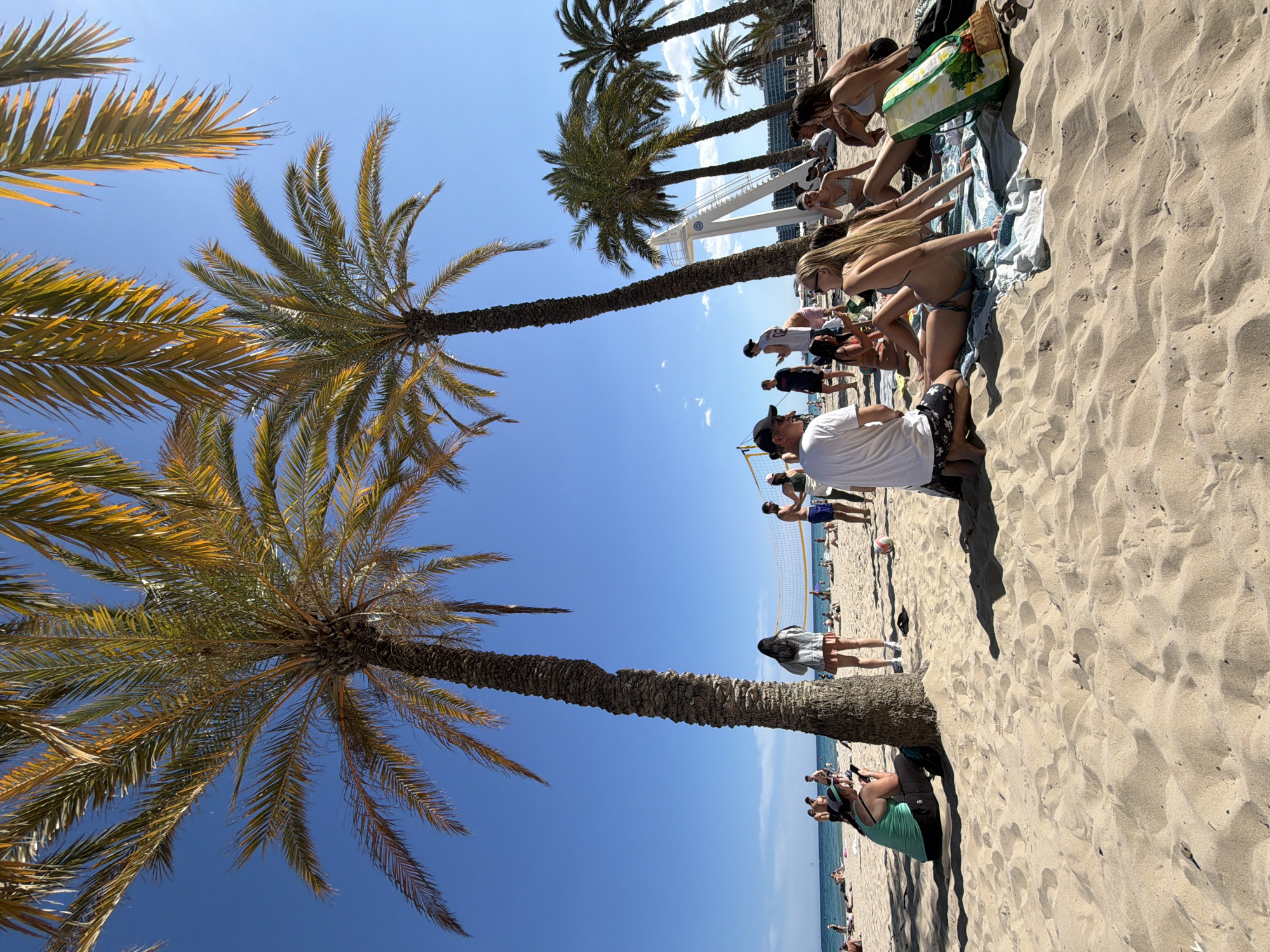 Sunny afternoon beach activities observed at Postiguet Beach, Alicante
