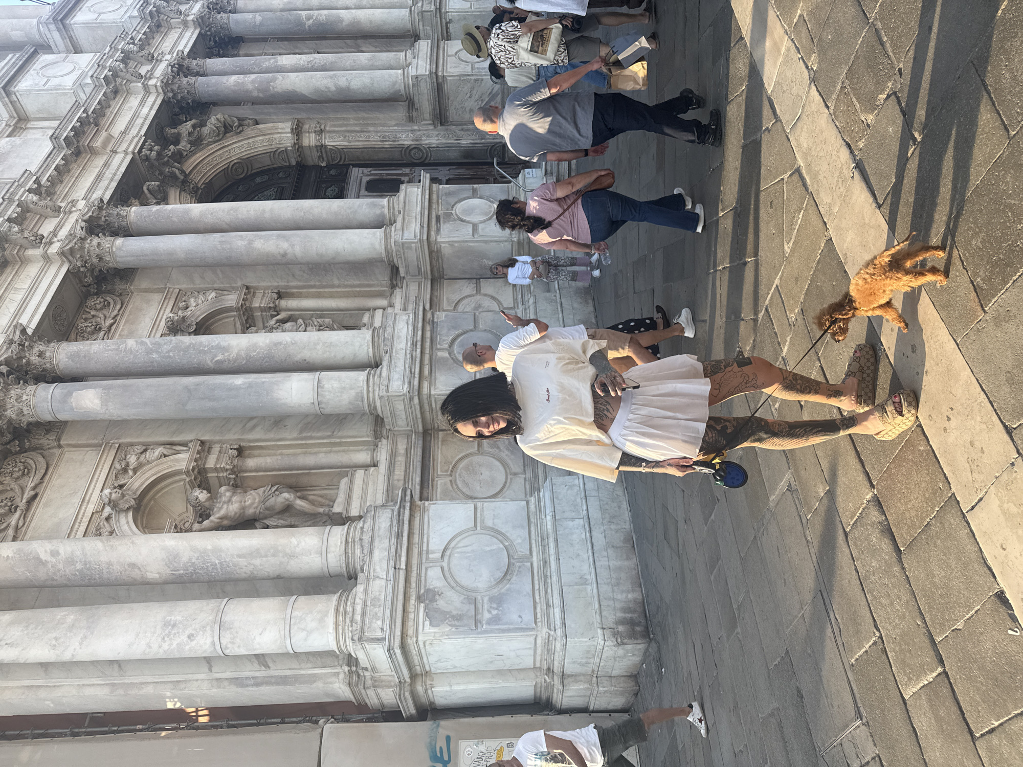 Tourists visit baroque architecture near Church of San Stae, Venice