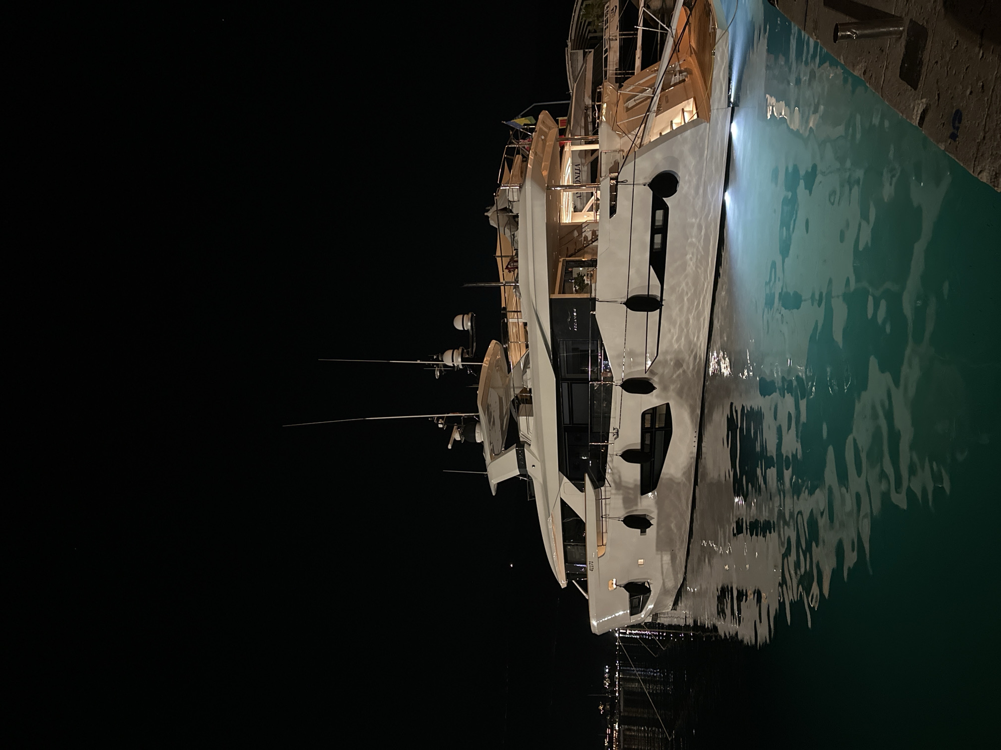 Luxury yachts light up Budva marina on a summer night