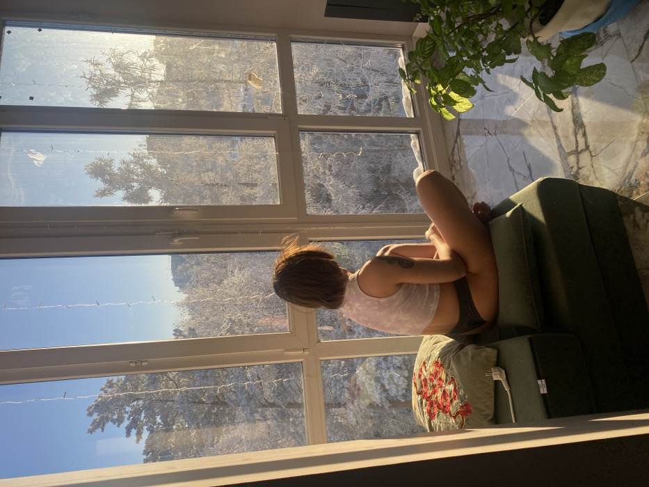 Woman captured in quiet winter moments in Ust-Ilimsk