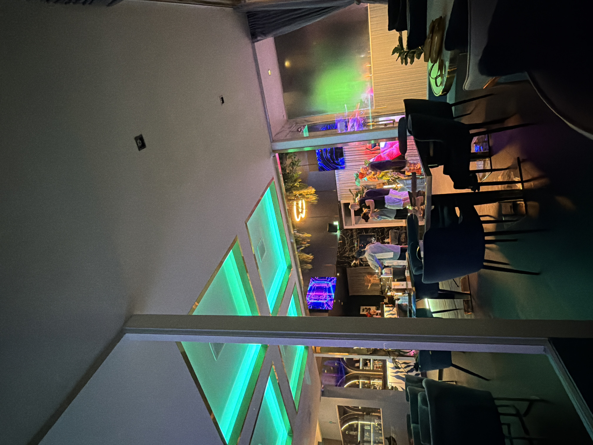 Inside Tempo lounge: neon lights, dancing, and social vibes