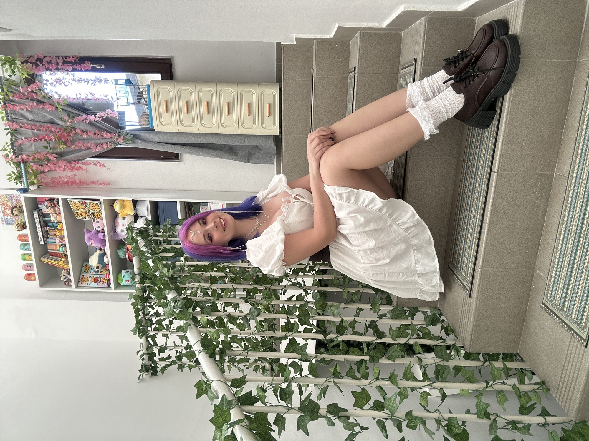 Woman poses for photos on decorated staircase in Zagreb
