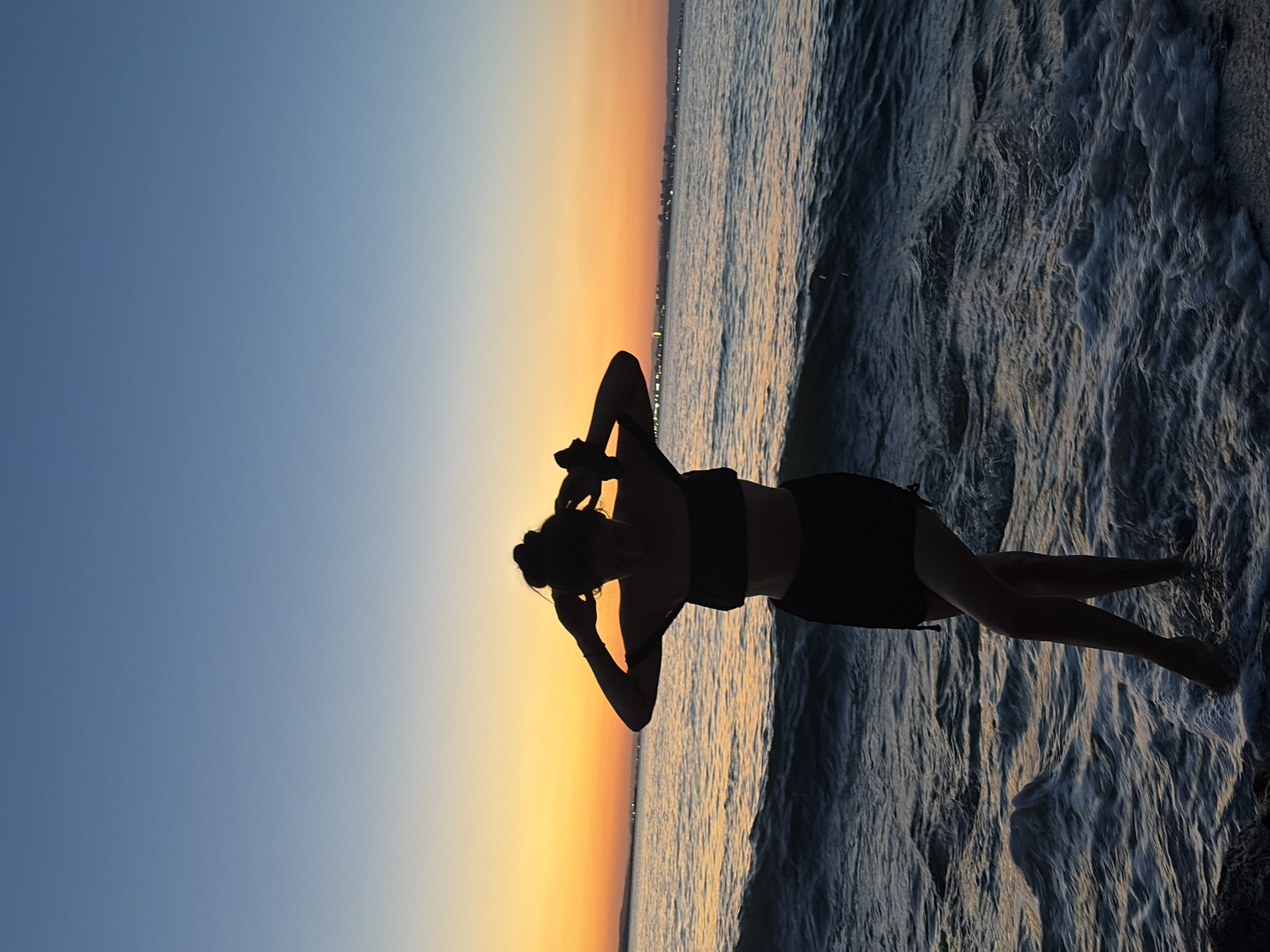 Silhouette in shallow Black Sea water, Burgas coastline