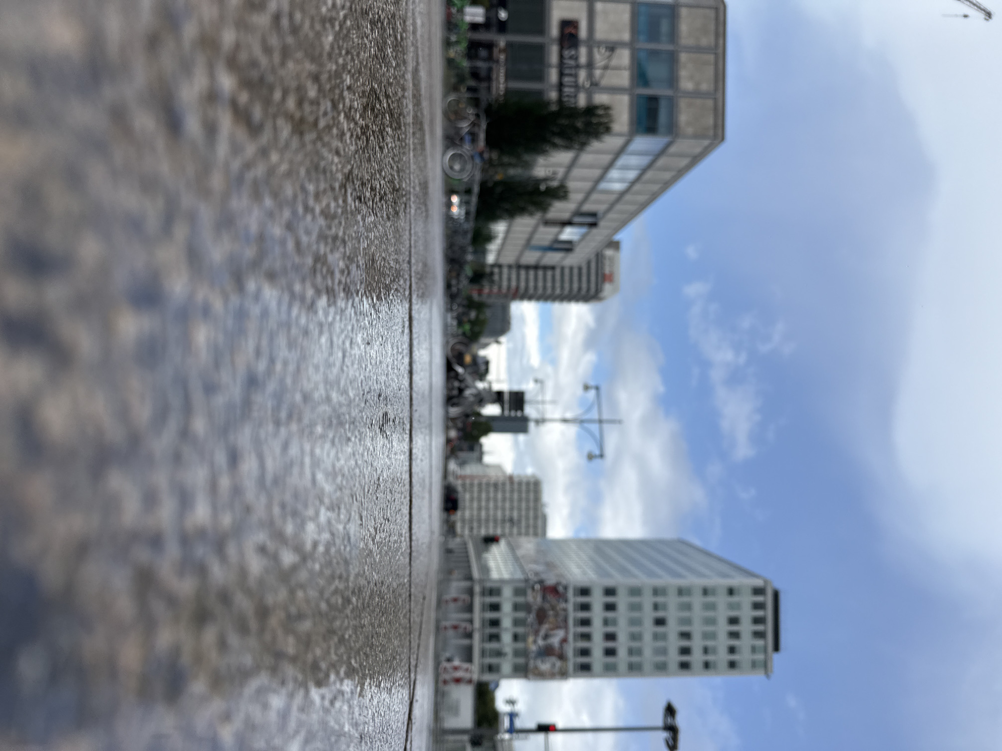 Berlin transit scenes around Alexanderplatz on rainy afternoon