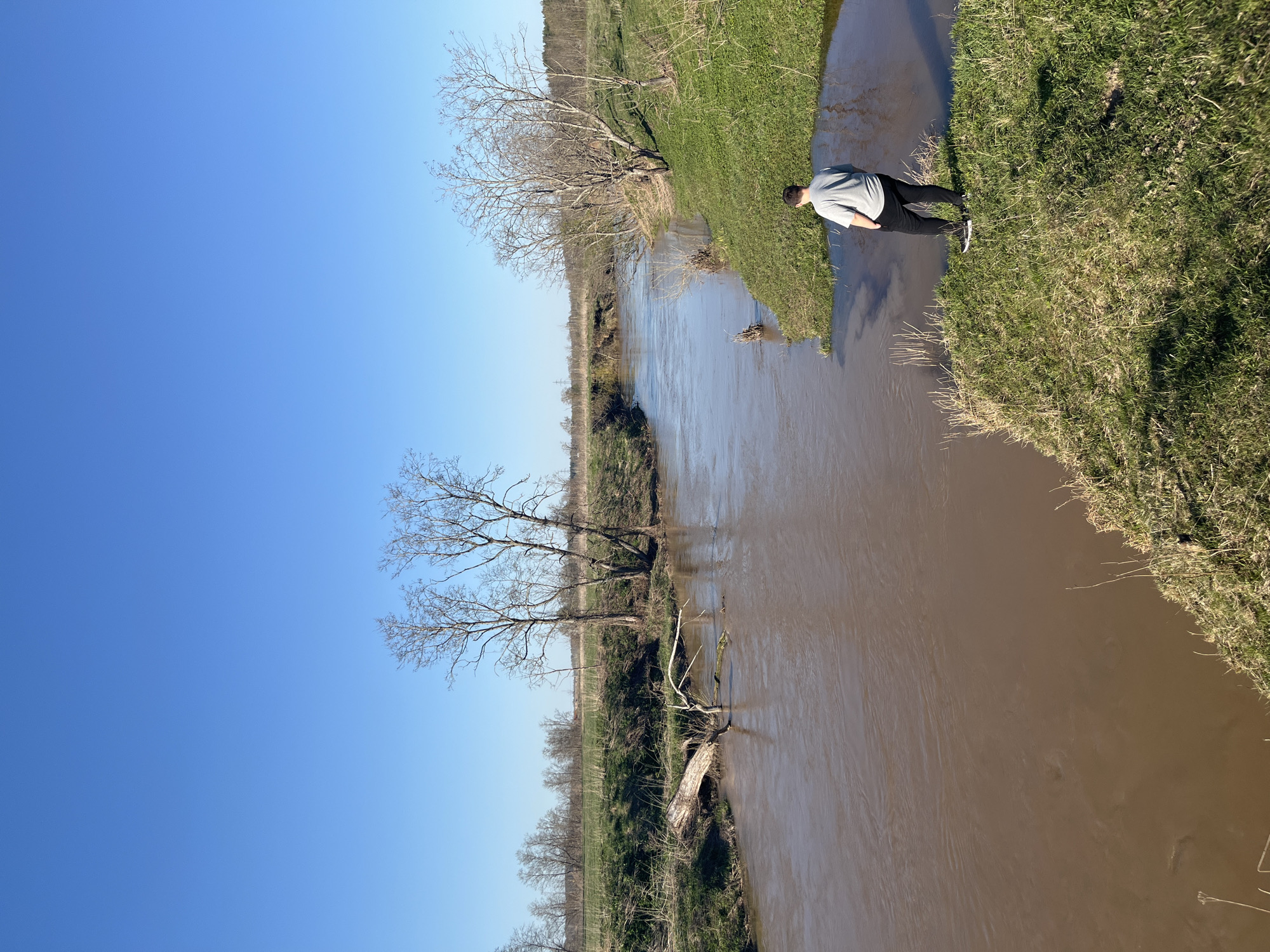 Witnesses document muddy river scenes near Voronino, Russia